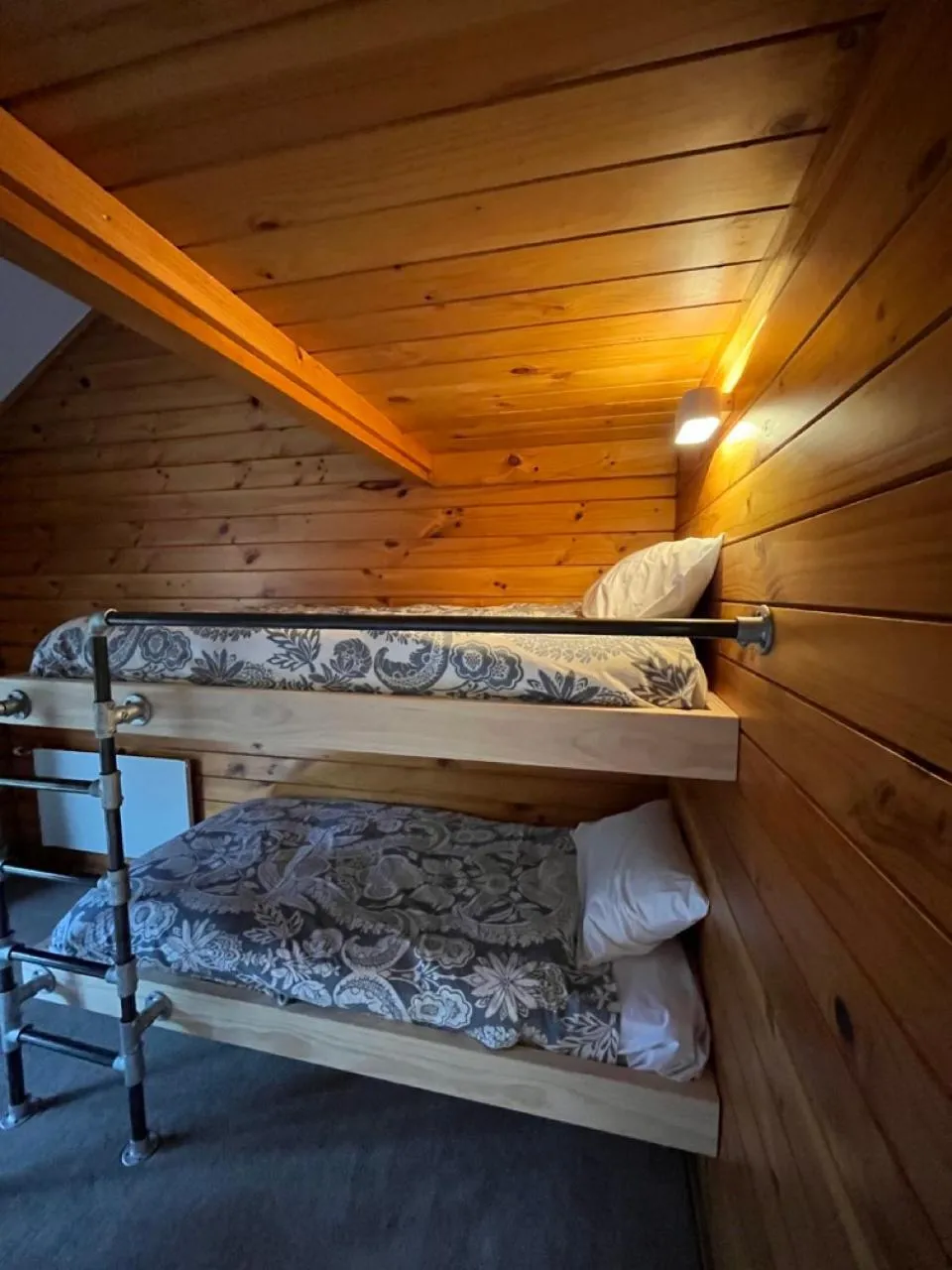 Bed in Smoke Lake Hot Springs Lodge & Camp