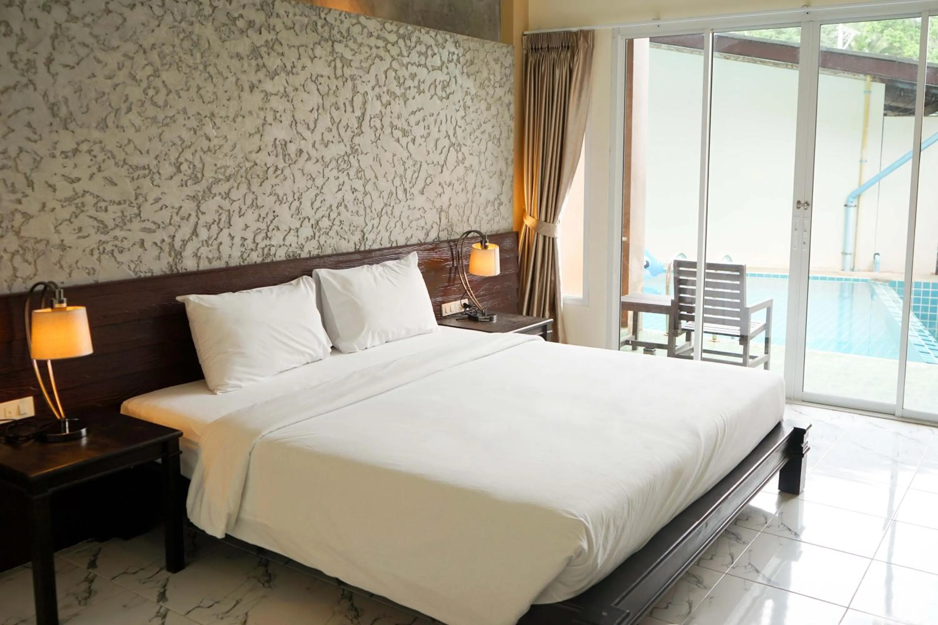 Bed in Khaolak Suthawan Resort - SHA Plus