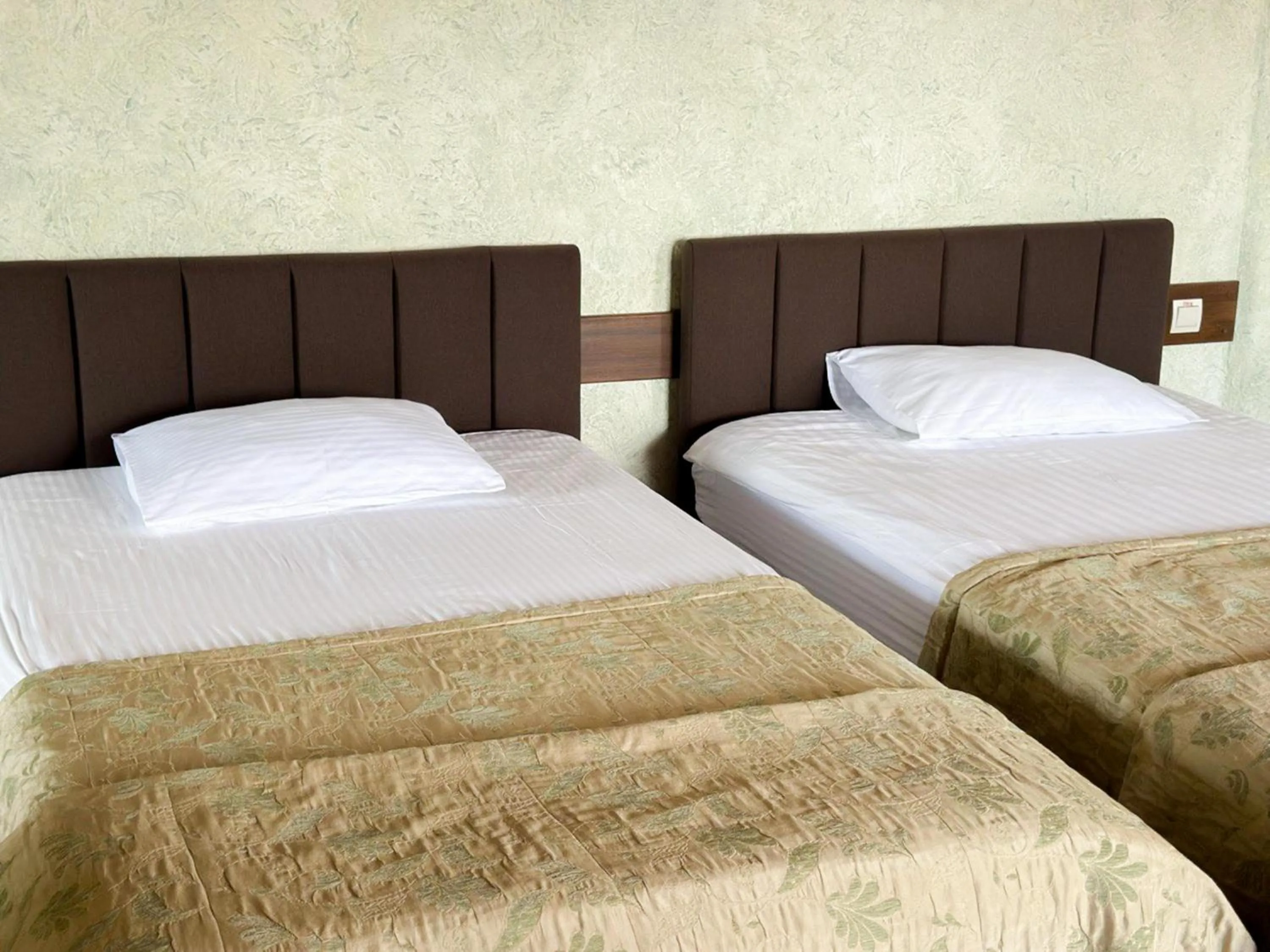 Bed in Charda Hotel