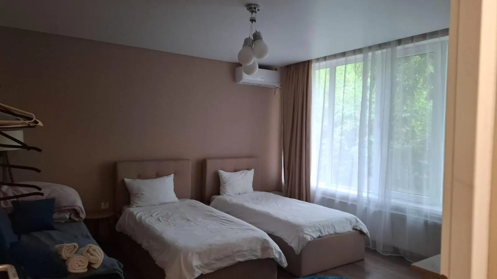 Bed in 4 Seasons Apartments