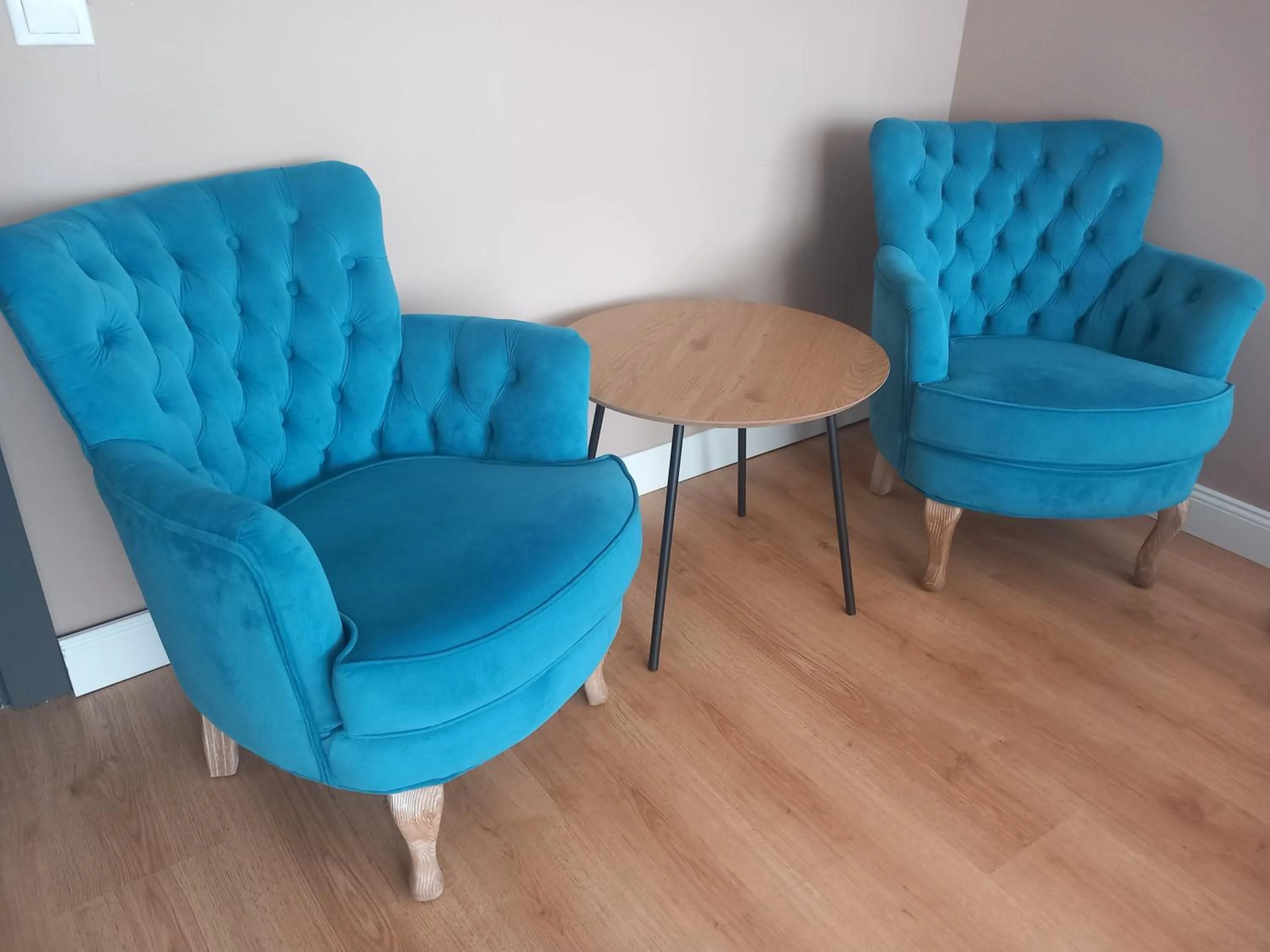 Seating area in 4 Seasons Apartments