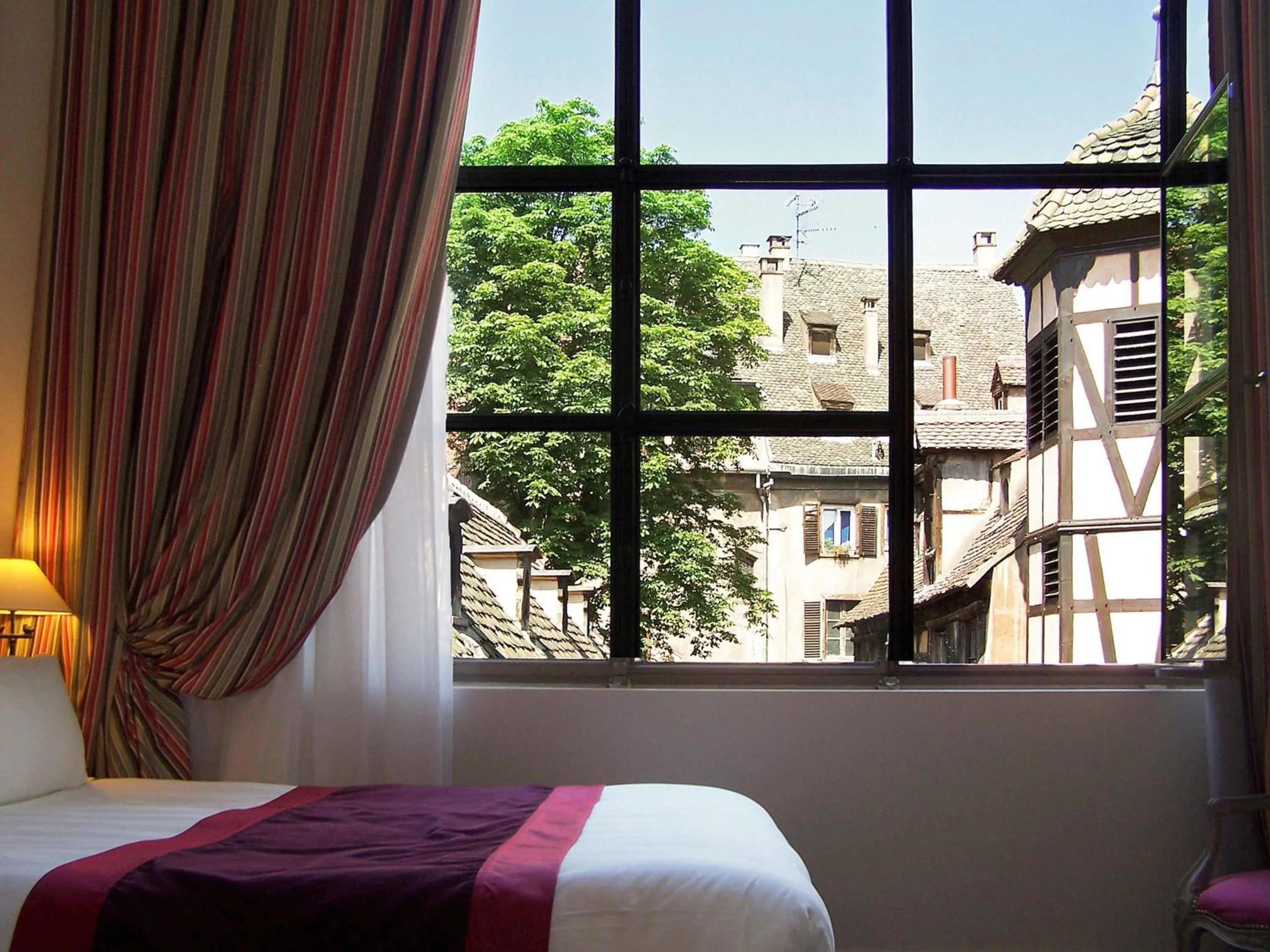 Bedroom, Bed in Cour du Corbeau Hotel Strasbourg - MGallery Collection
