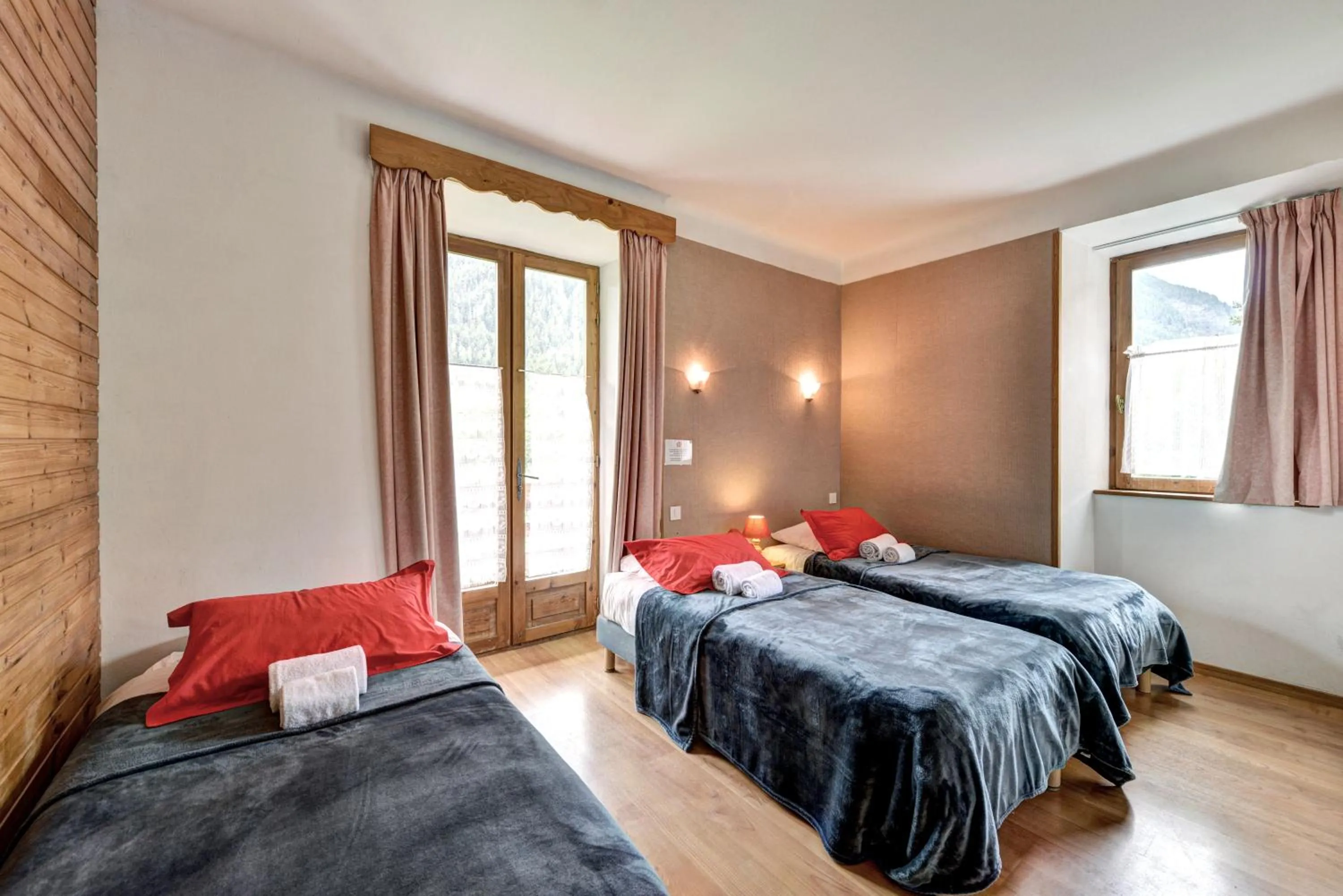 Bed in Hôtel Restaurant Gîtes Les 5 Saisons