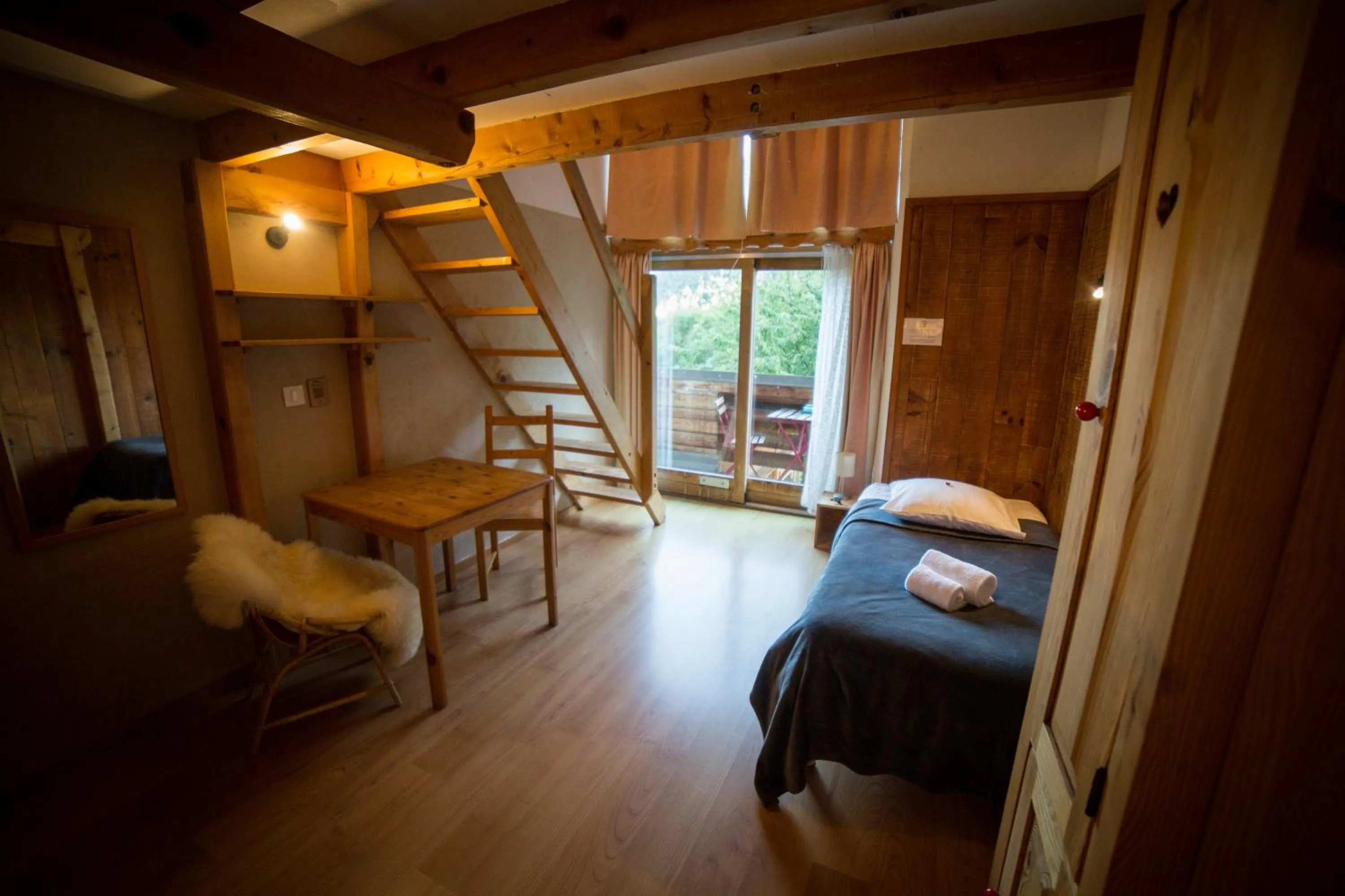 Bed in Hôtel Restaurant Gîtes Les 5 Saisons