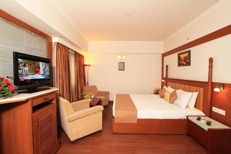 Photo of the whole room, Bed in Parijatha Gateway