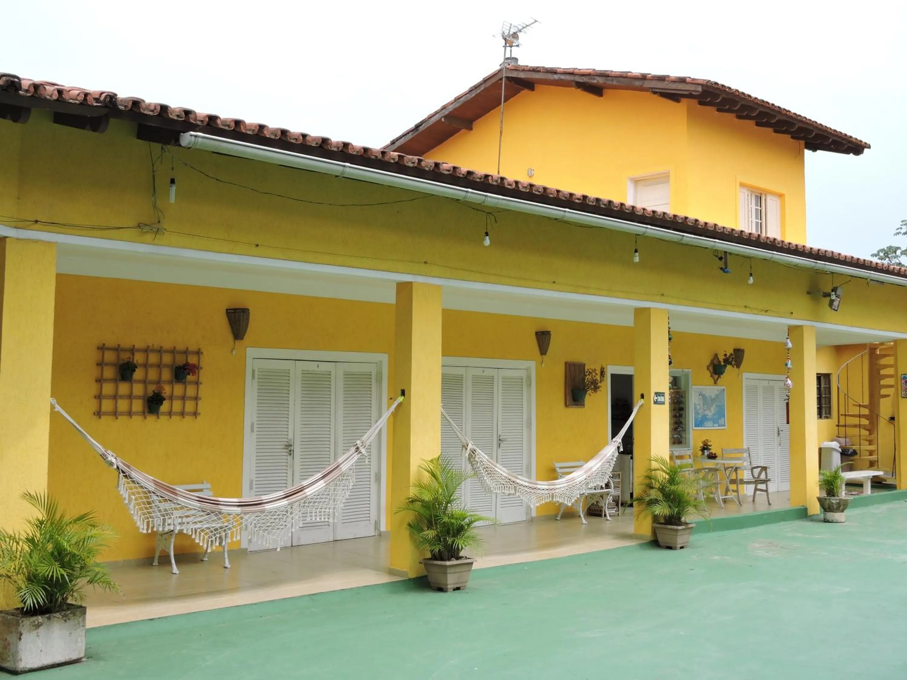 Balcony/Terrace in Pousada Sorocotuba - Piscina Aquecida