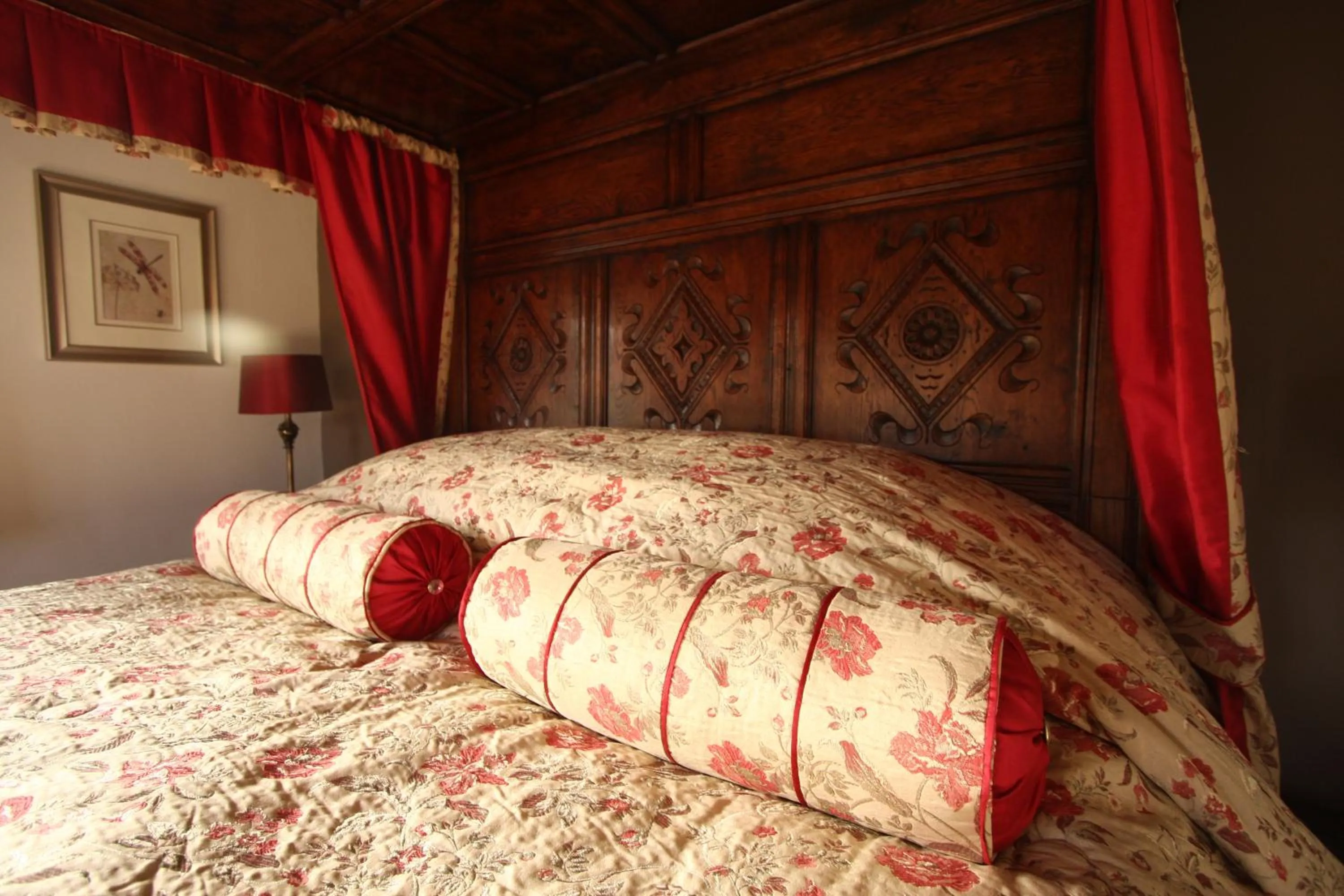 Bed in The Oxenham Arms Hotel Devon