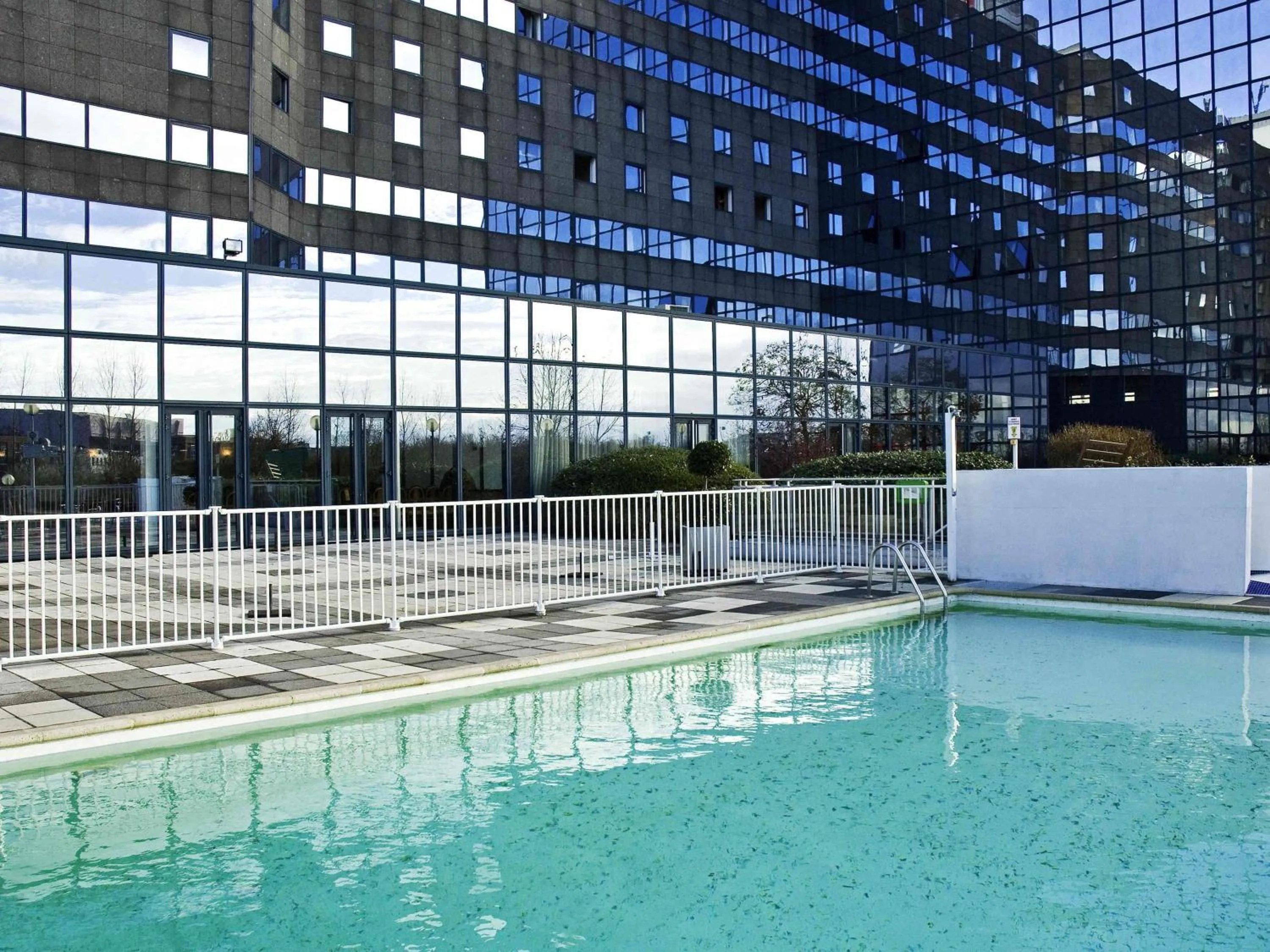 Pool view in Ibis Marne la Vallée Noisy