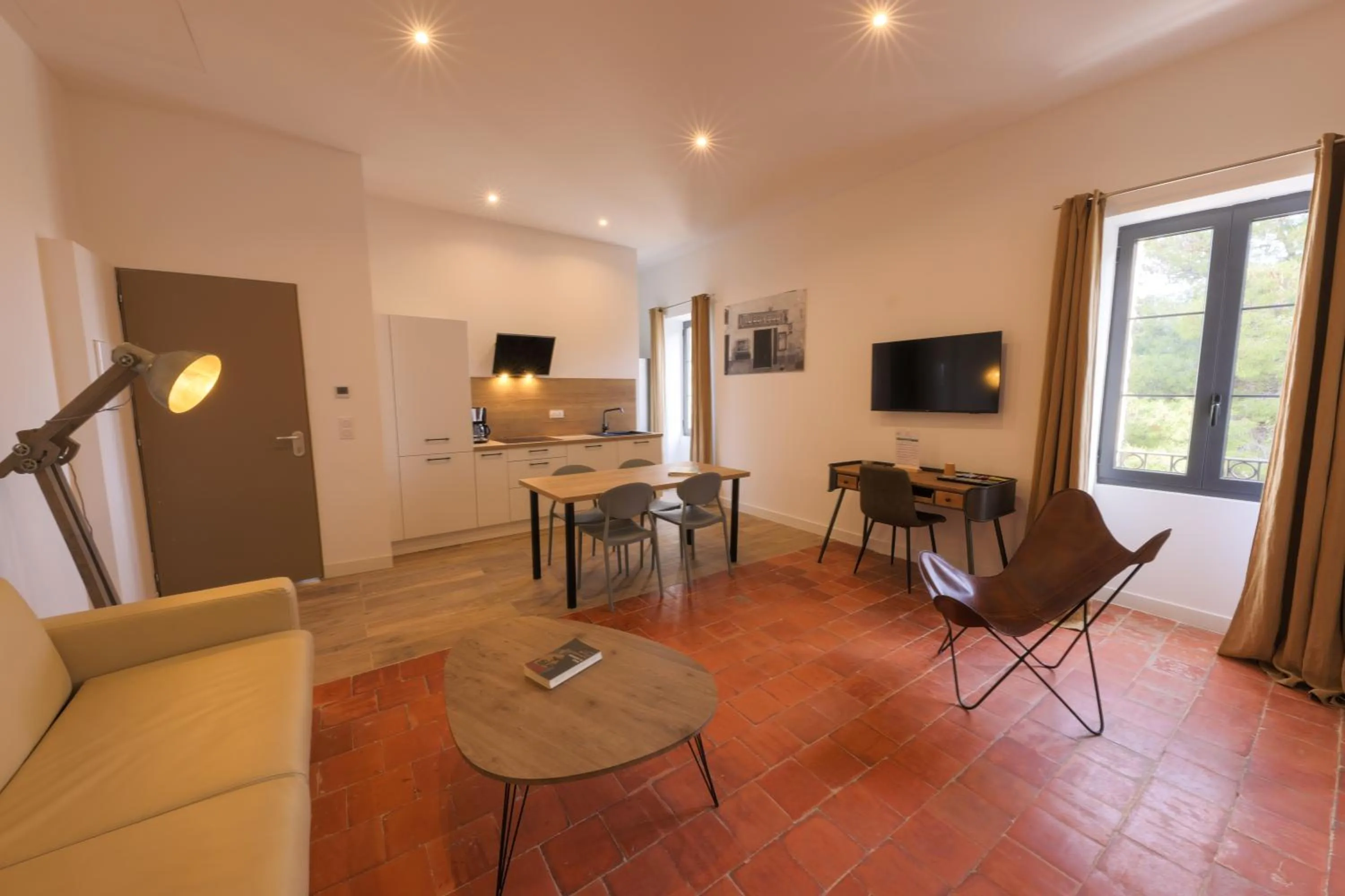 Communal lounge/ TV room in Hôtel Casa Rossa & Spa