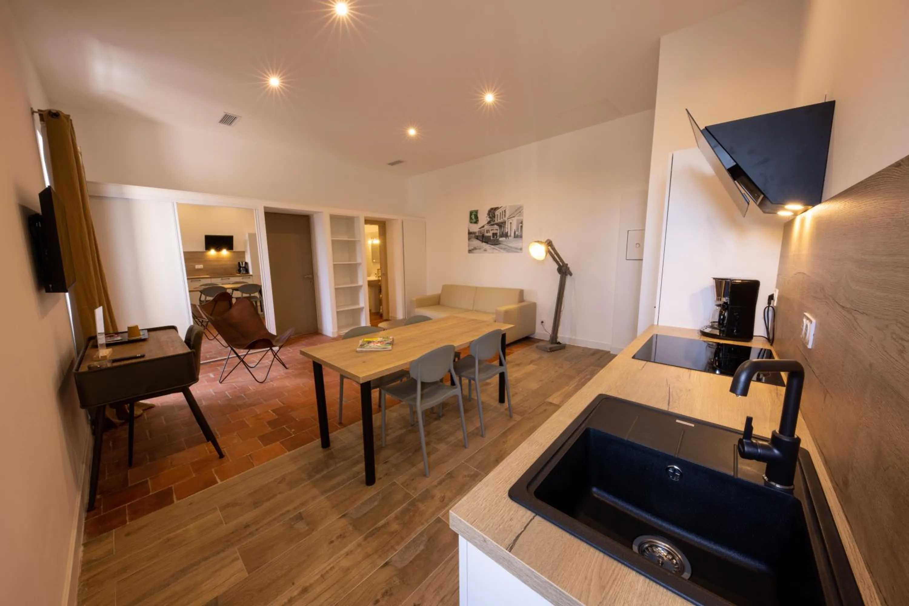 Communal lounge/ TV room in Hôtel Casa Rossa & Spa