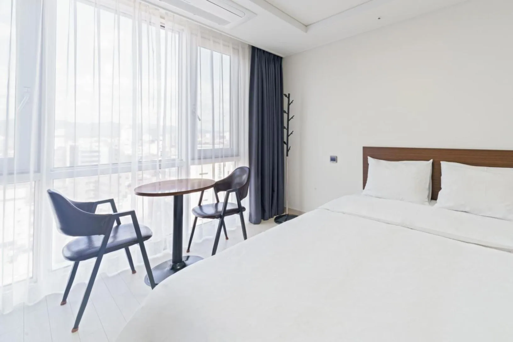 Bed in The Venezia Suite Hotel