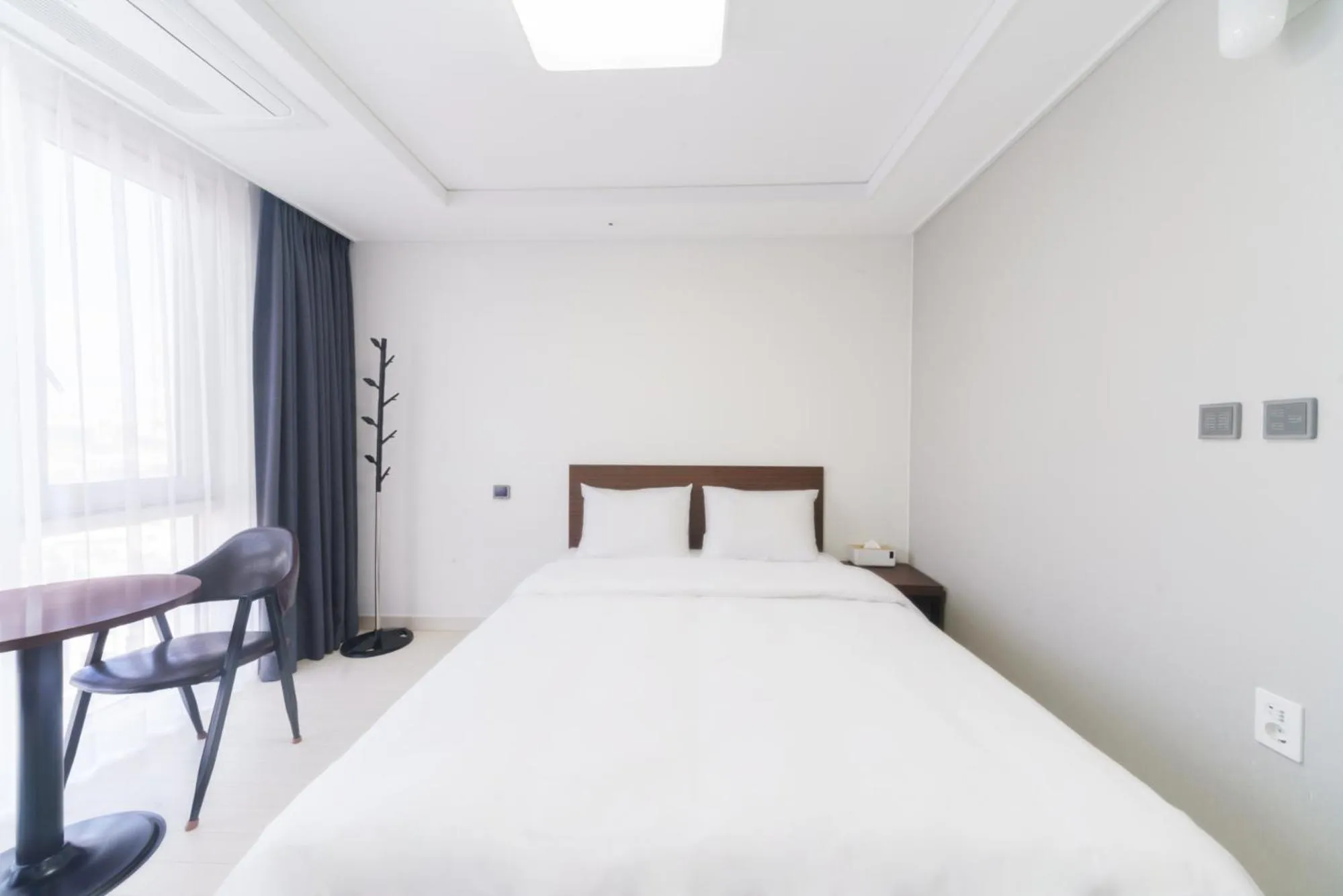 Bed in The Venezia Suite Hotel