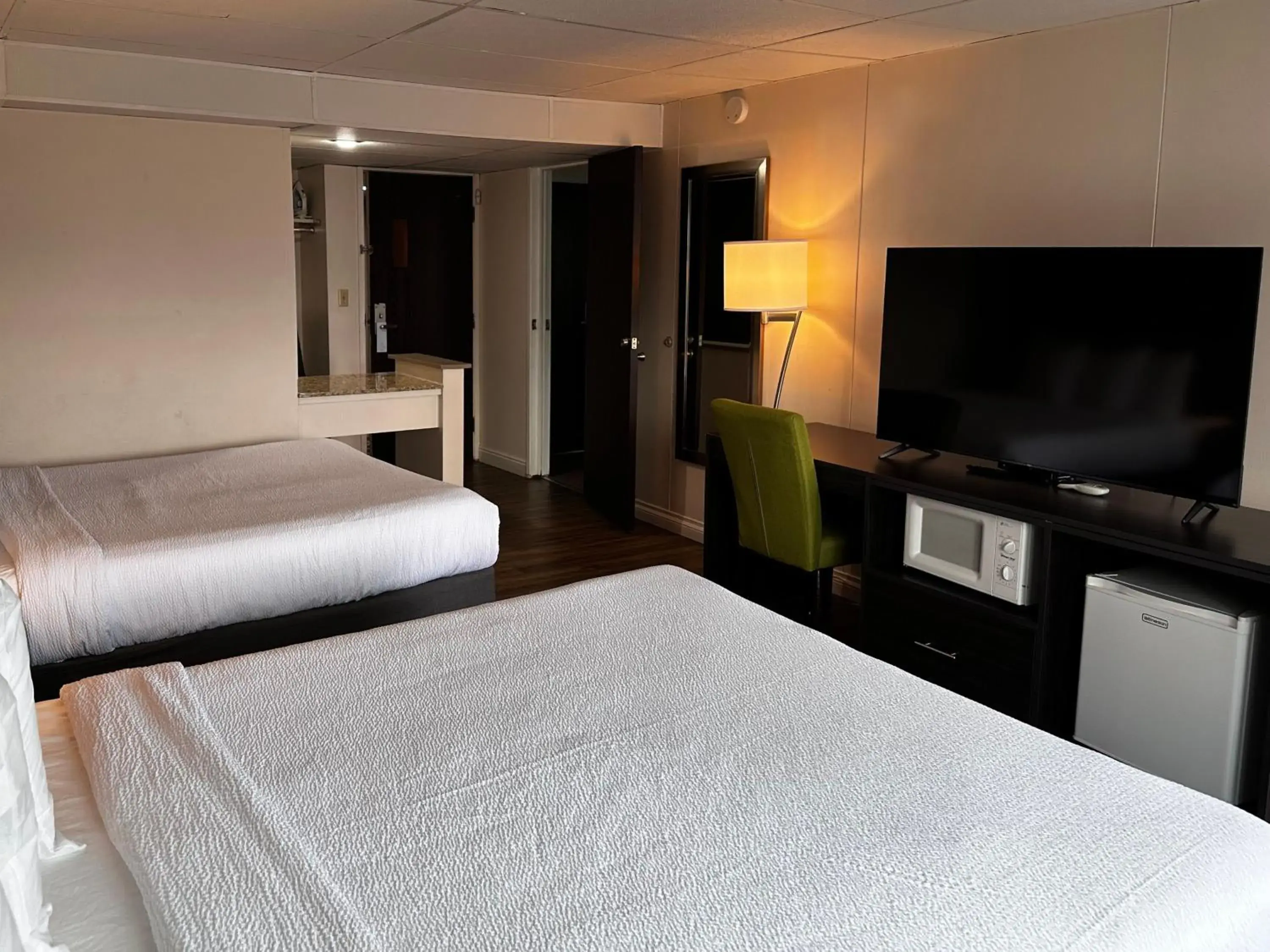 Queen Room with Two Queen Beds in Rocky Mountain Hotel & Conference Center Queen Room with Two Queen Beds in Rocky Mountain Hotel & Conference Center