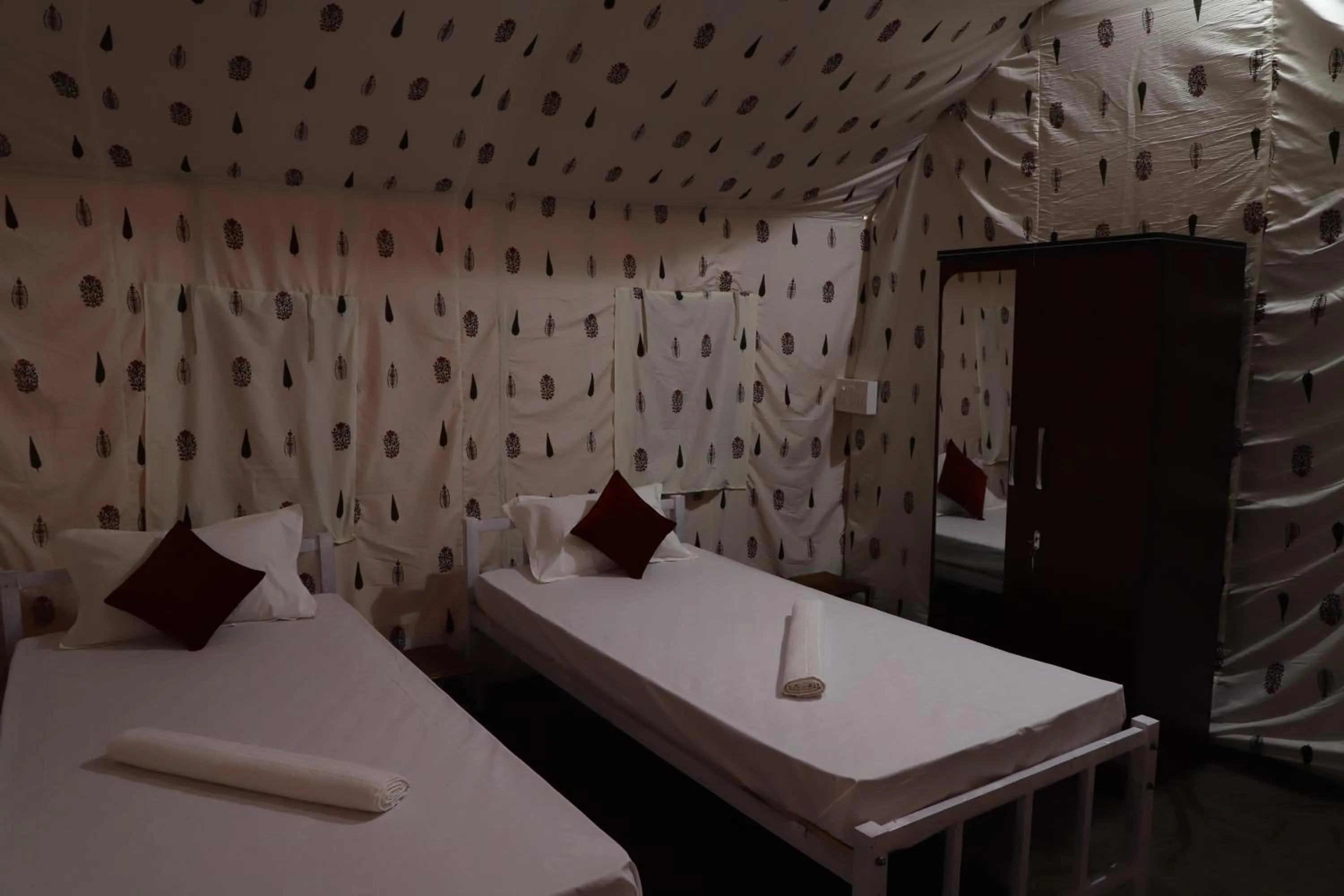 Bed in Kaziranga Eco Camp