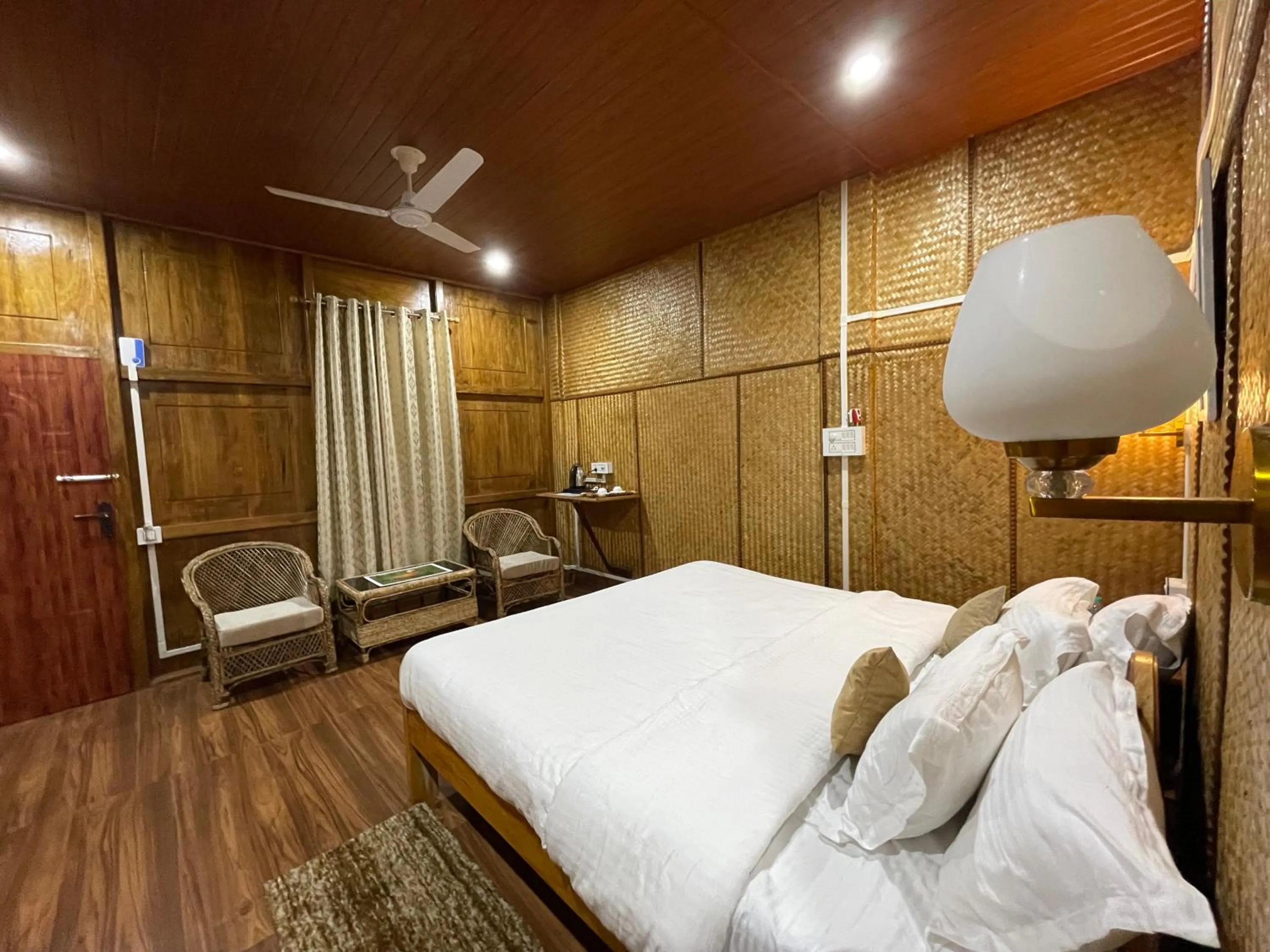 Bed in Kaziranga Eco Camp