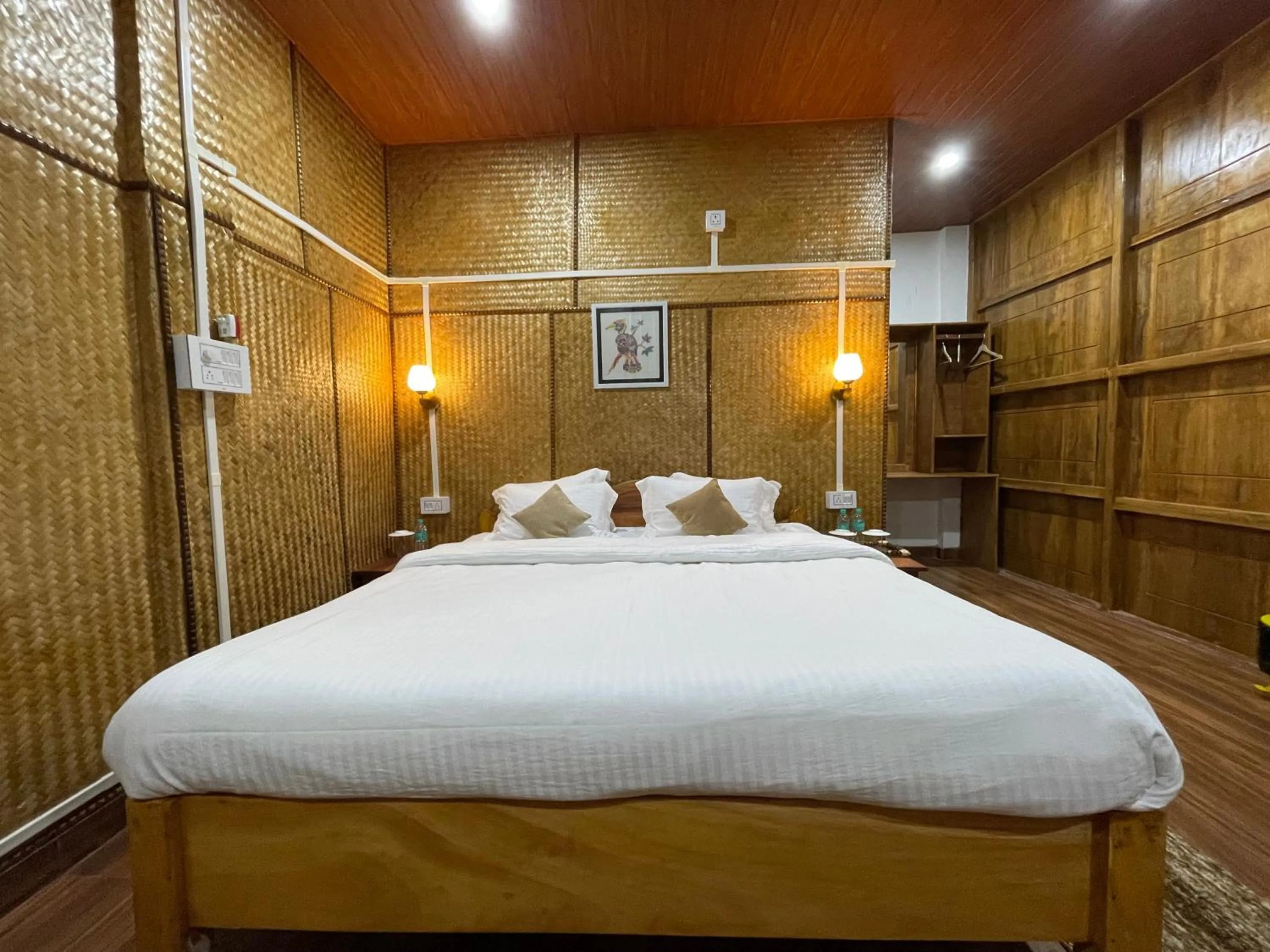 Bed in Kaziranga Eco Camp
