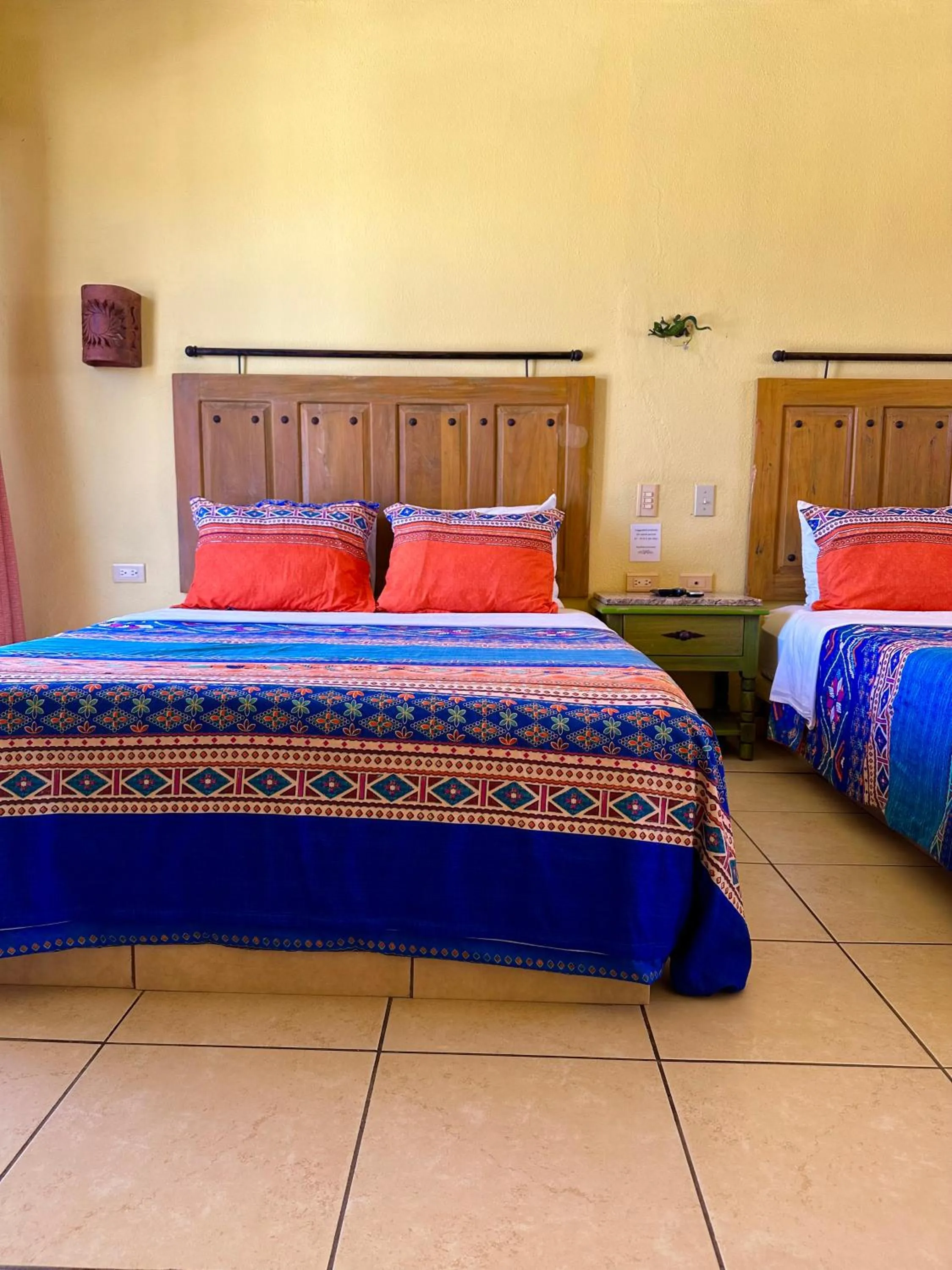 Bed in Siesta Suites Boutique Hotel