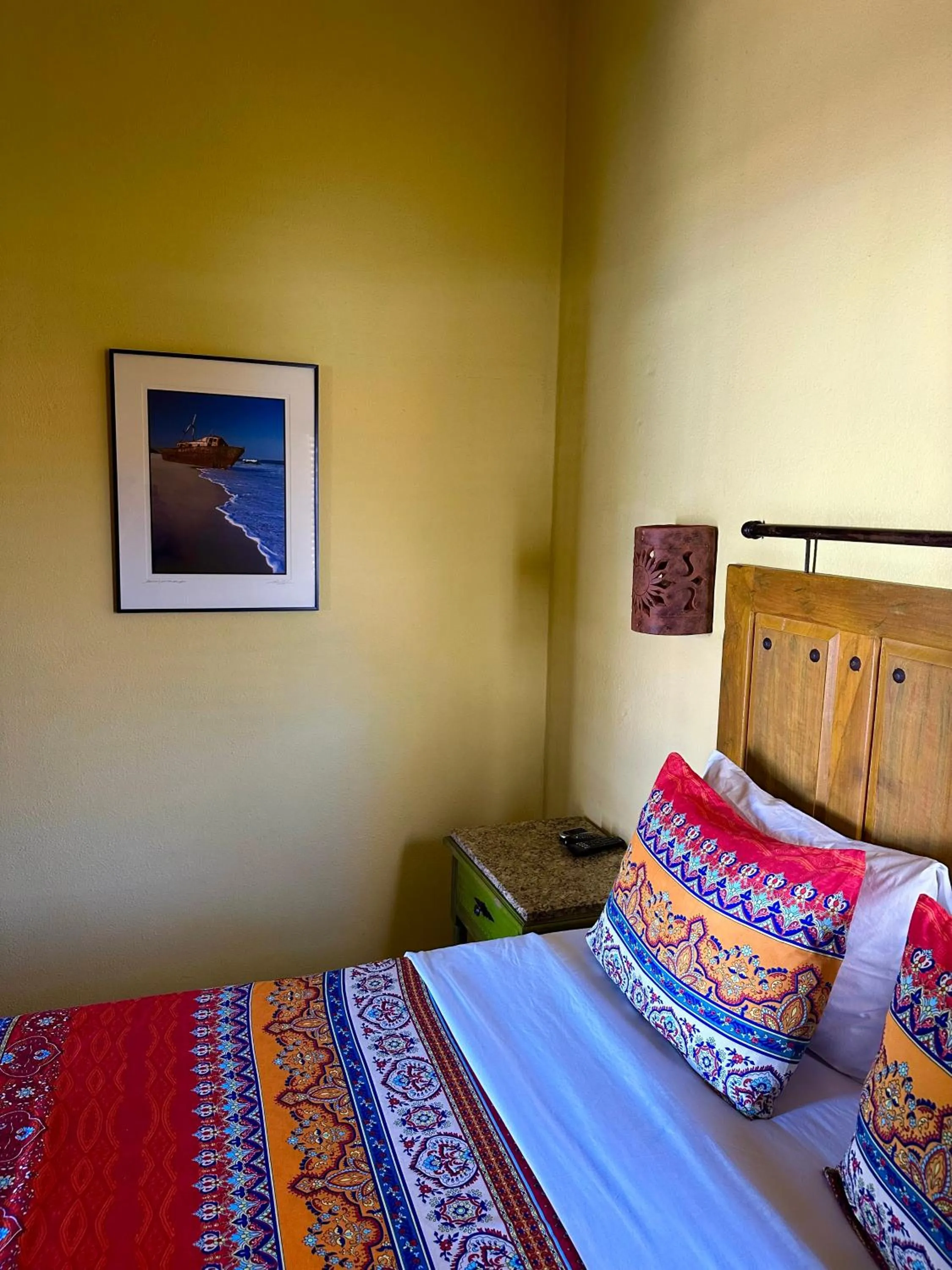 Bed in Siesta Suites Boutique Hotel