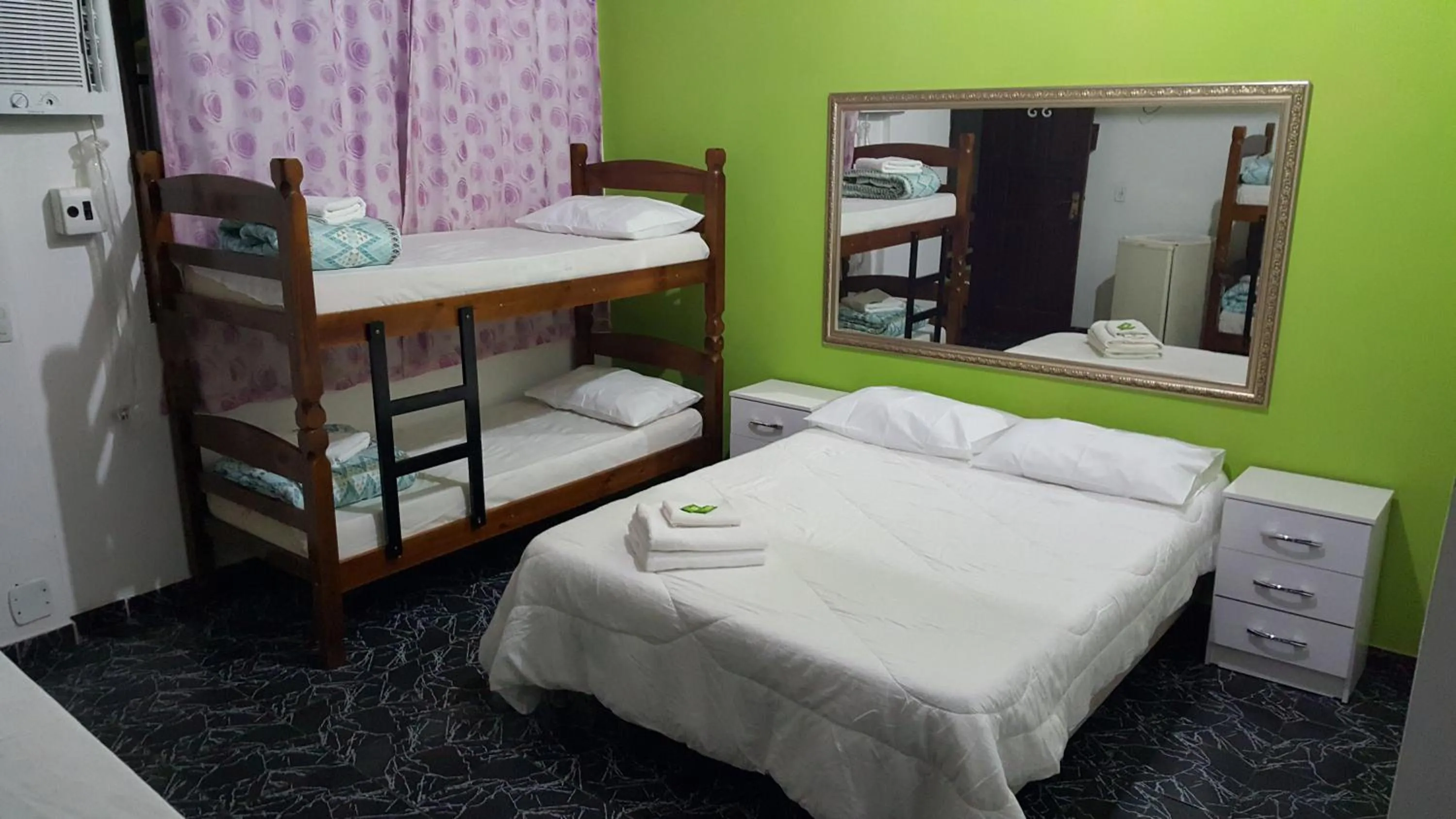 Bed in Pousada Ferradura Beach