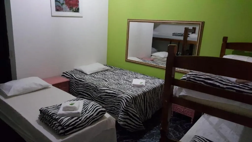 Bed in Pousada Ferradura Beach