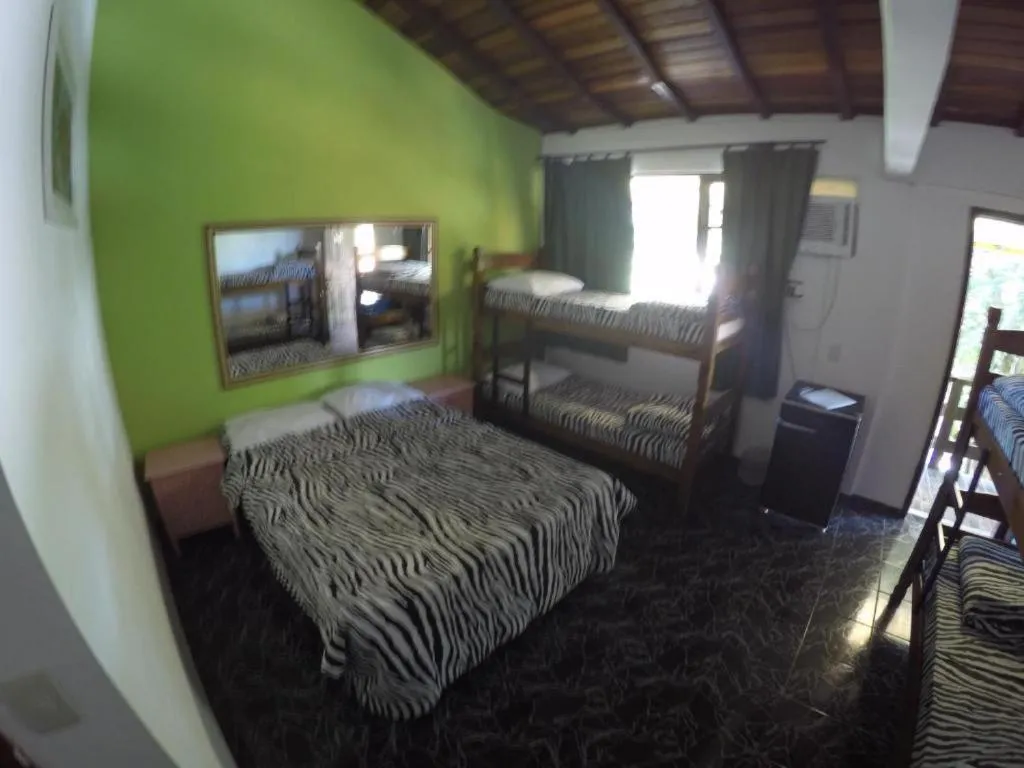 Bed in Pousada Ferradura Beach