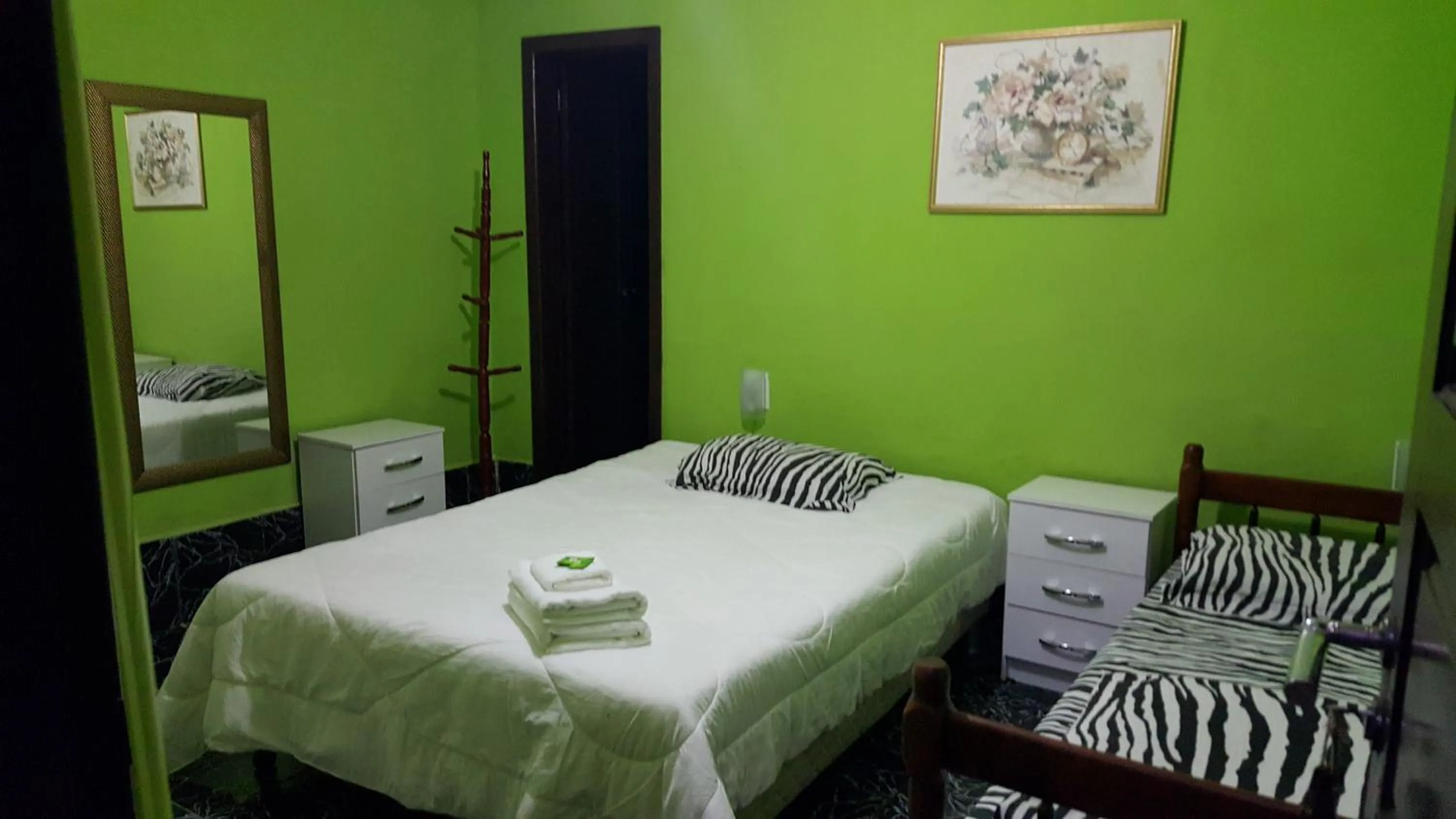 Bed in Pousada Ferradura Beach