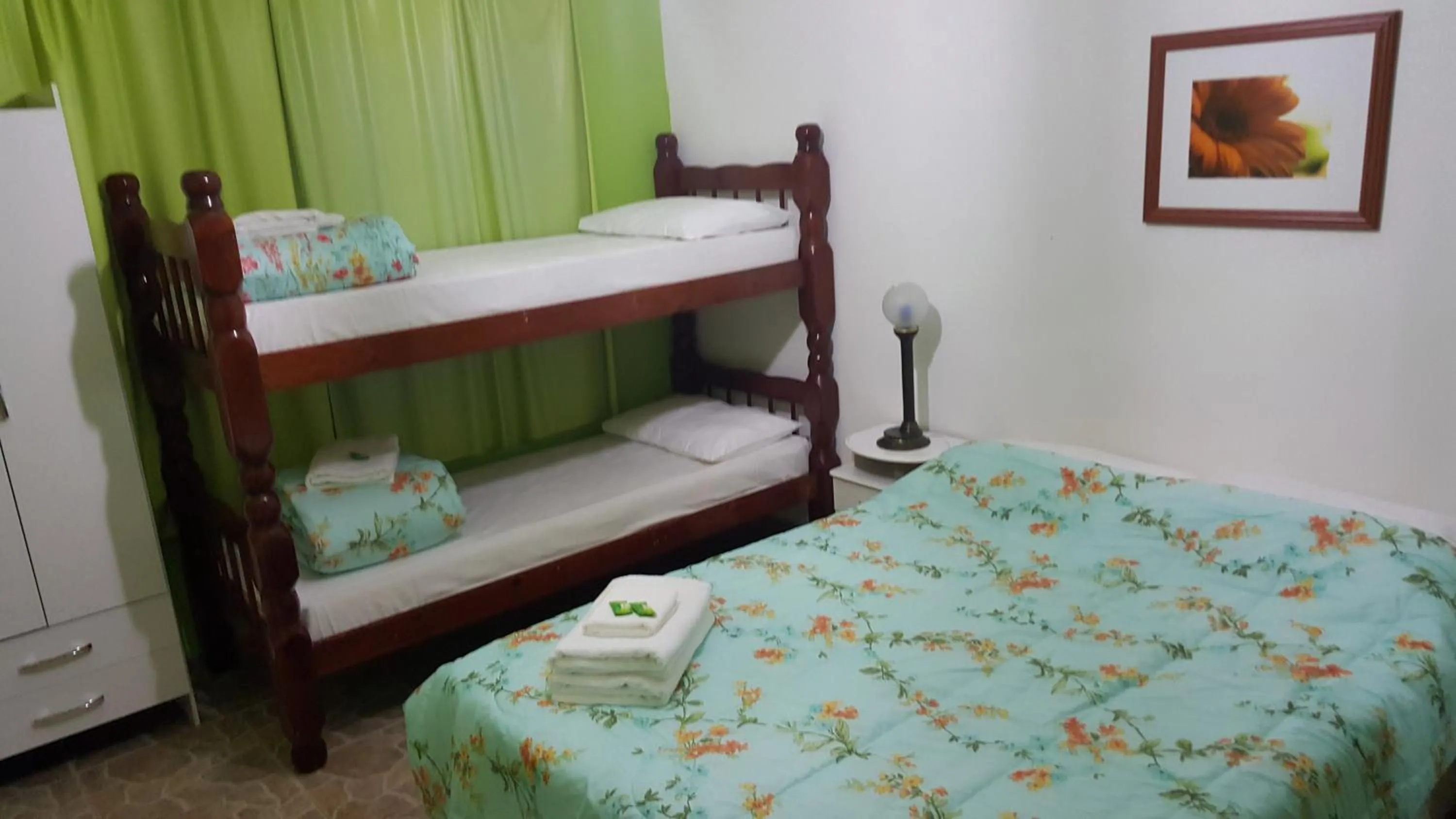 Bed in Pousada Ferradura Beach