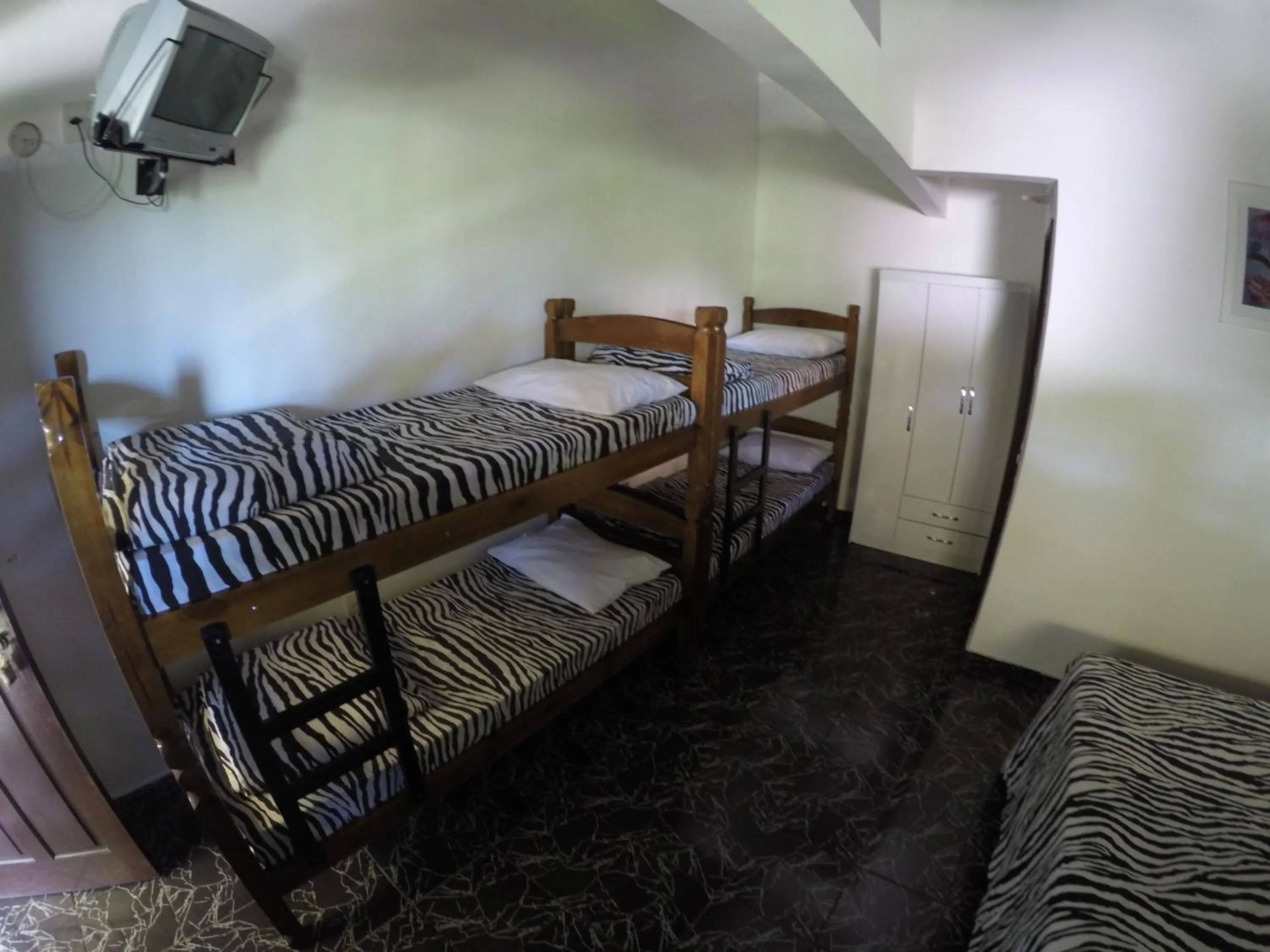 Bed in Pousada Ferradura Beach