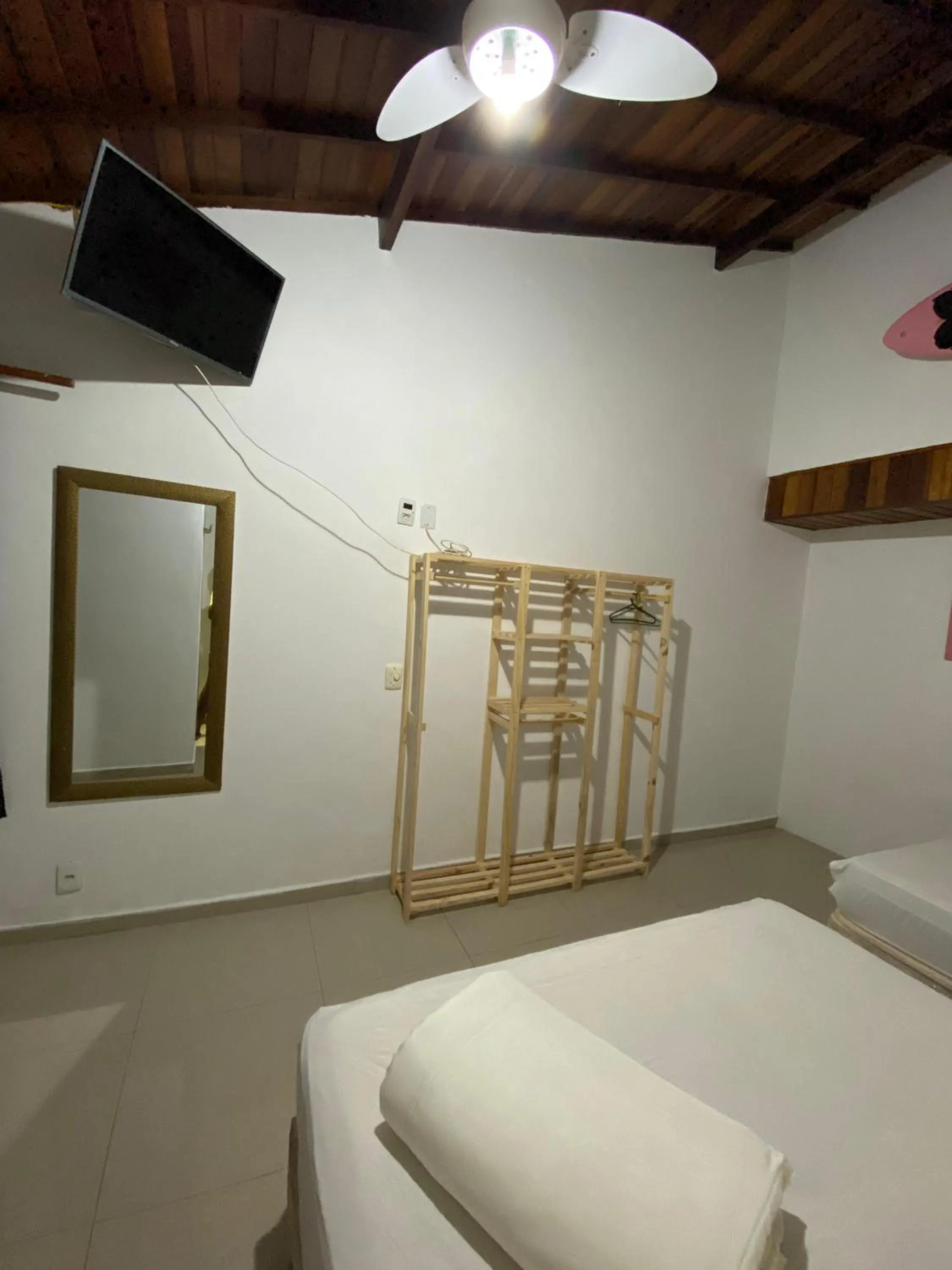 Bed in Pousada Ferradura Beach