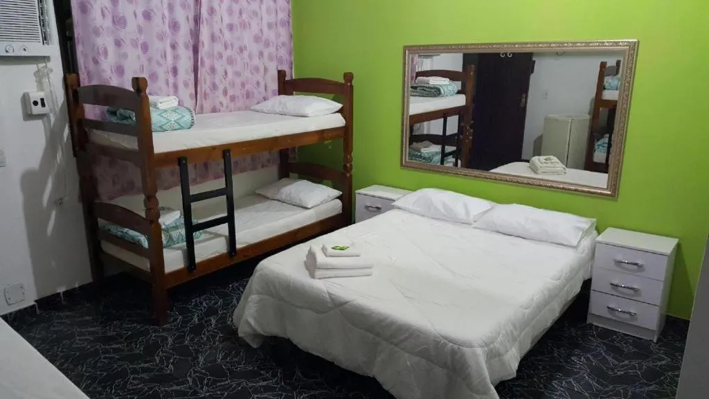 Bed in Pousada Ferradura Beach