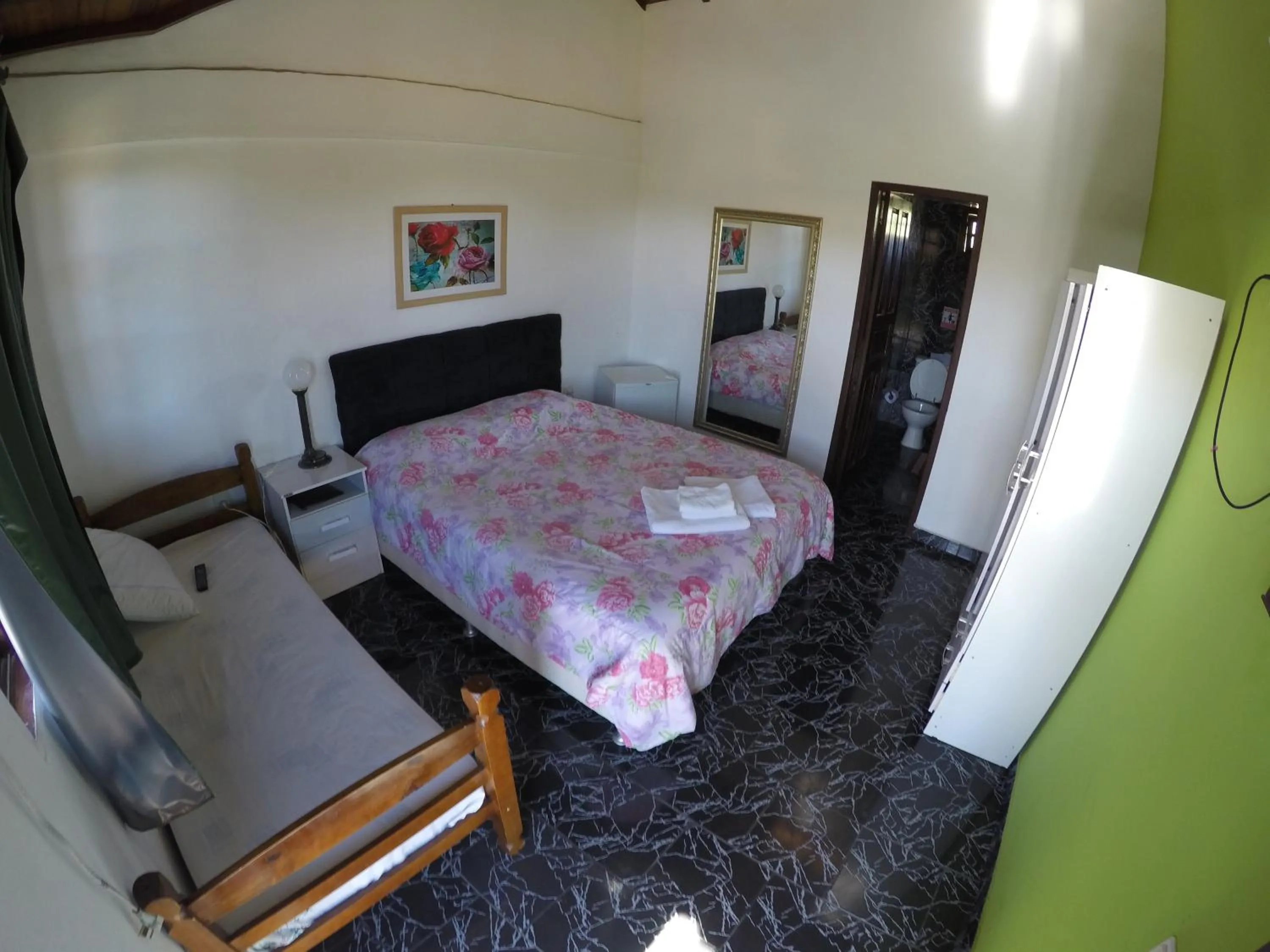 Bed in Pousada Ferradura Beach