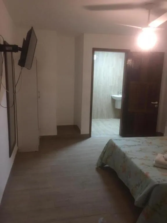 Bed in Pousada Ferradura Beach