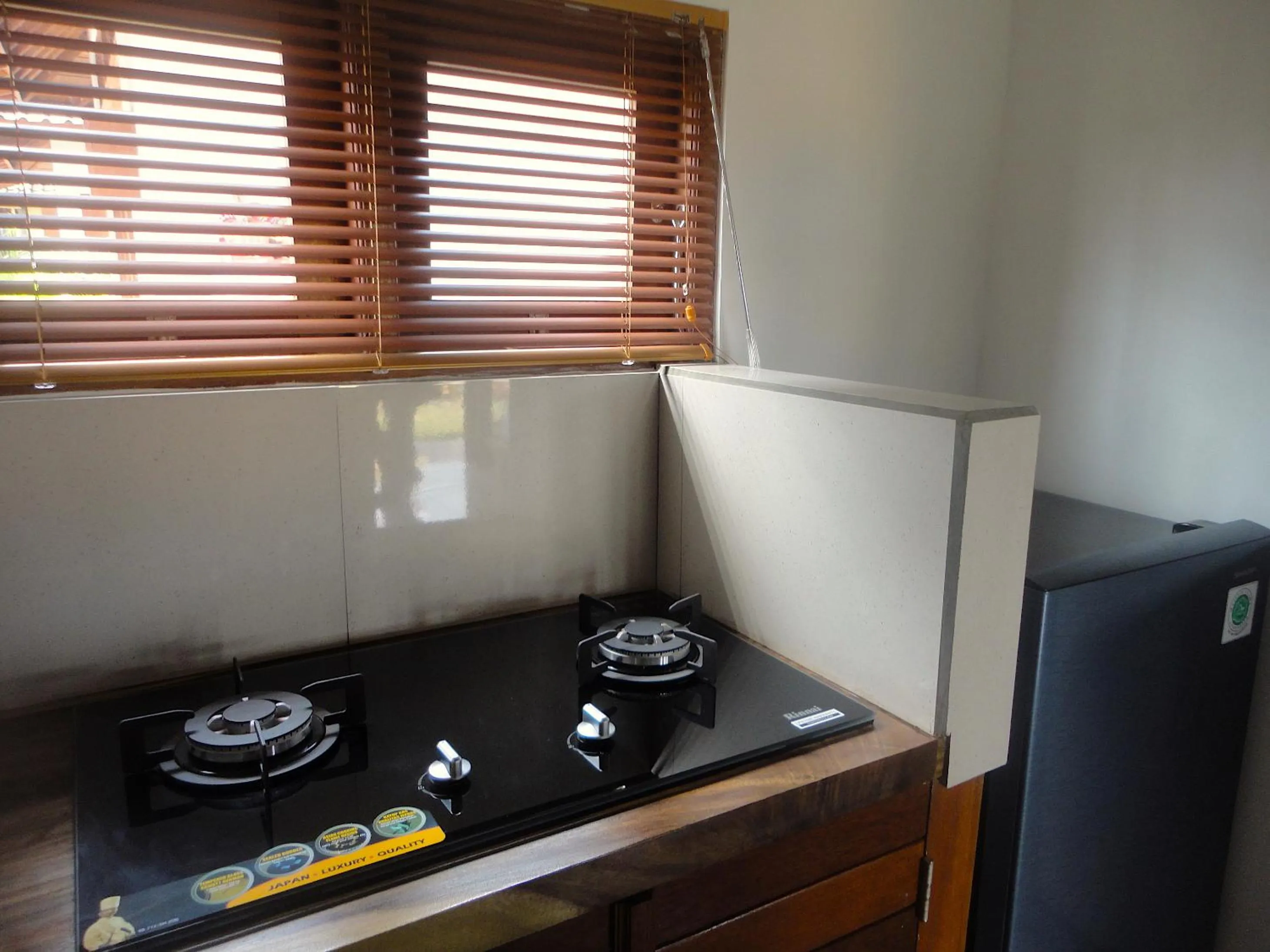 Kitchen or kitchenette in Paraiso Cottage Ubud