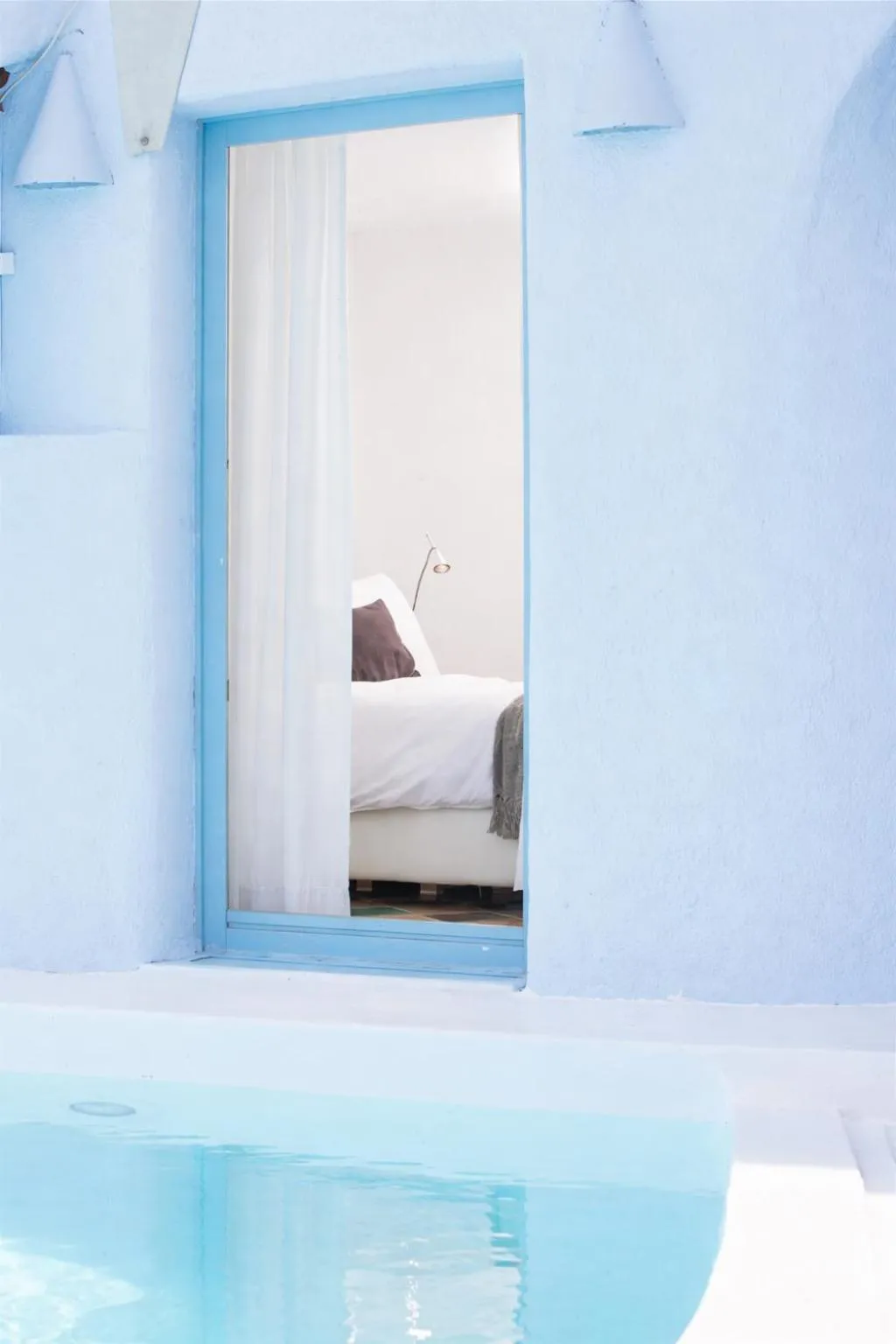 Bed in Ikastikies Suites