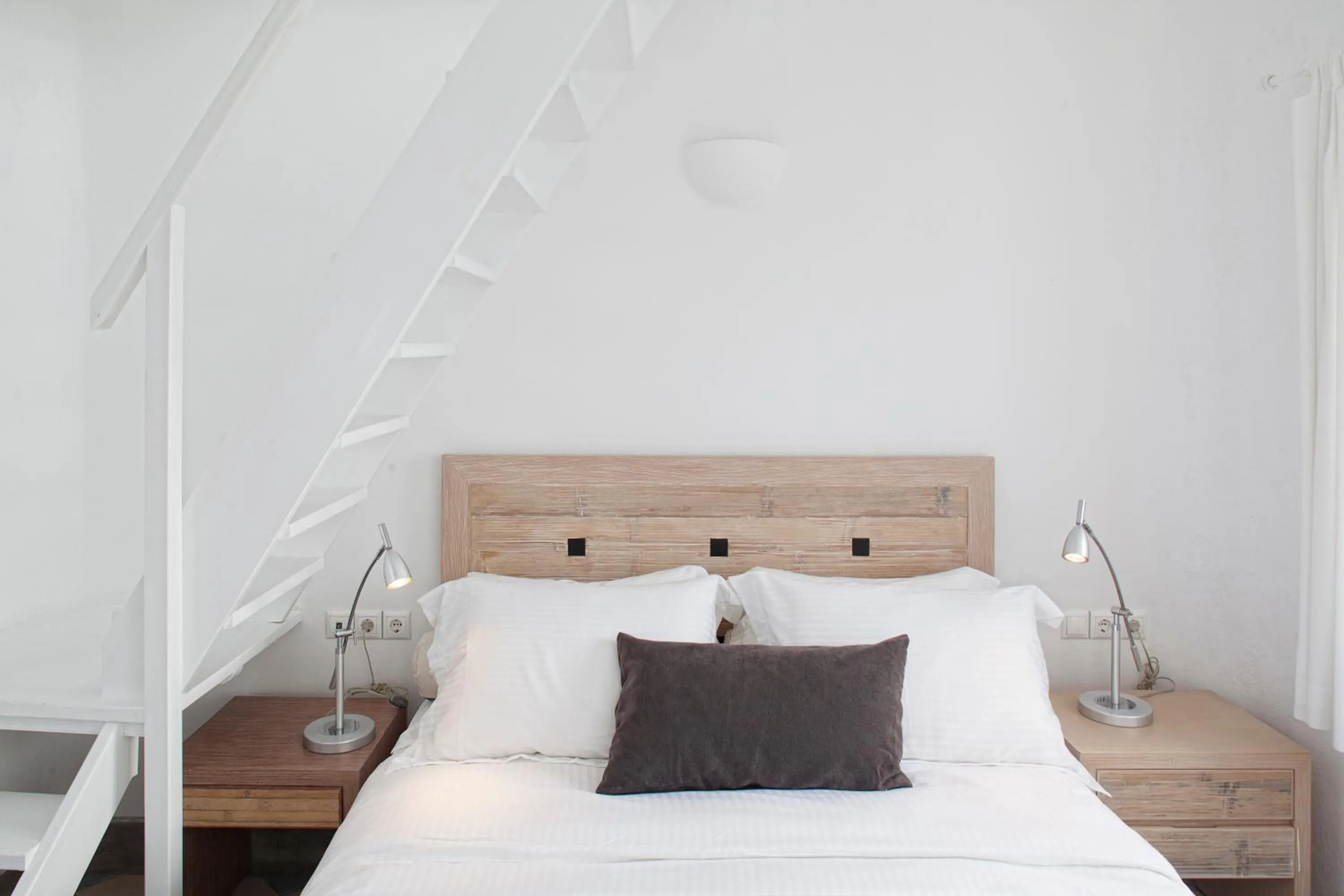 Bed in Ikastikies Suites