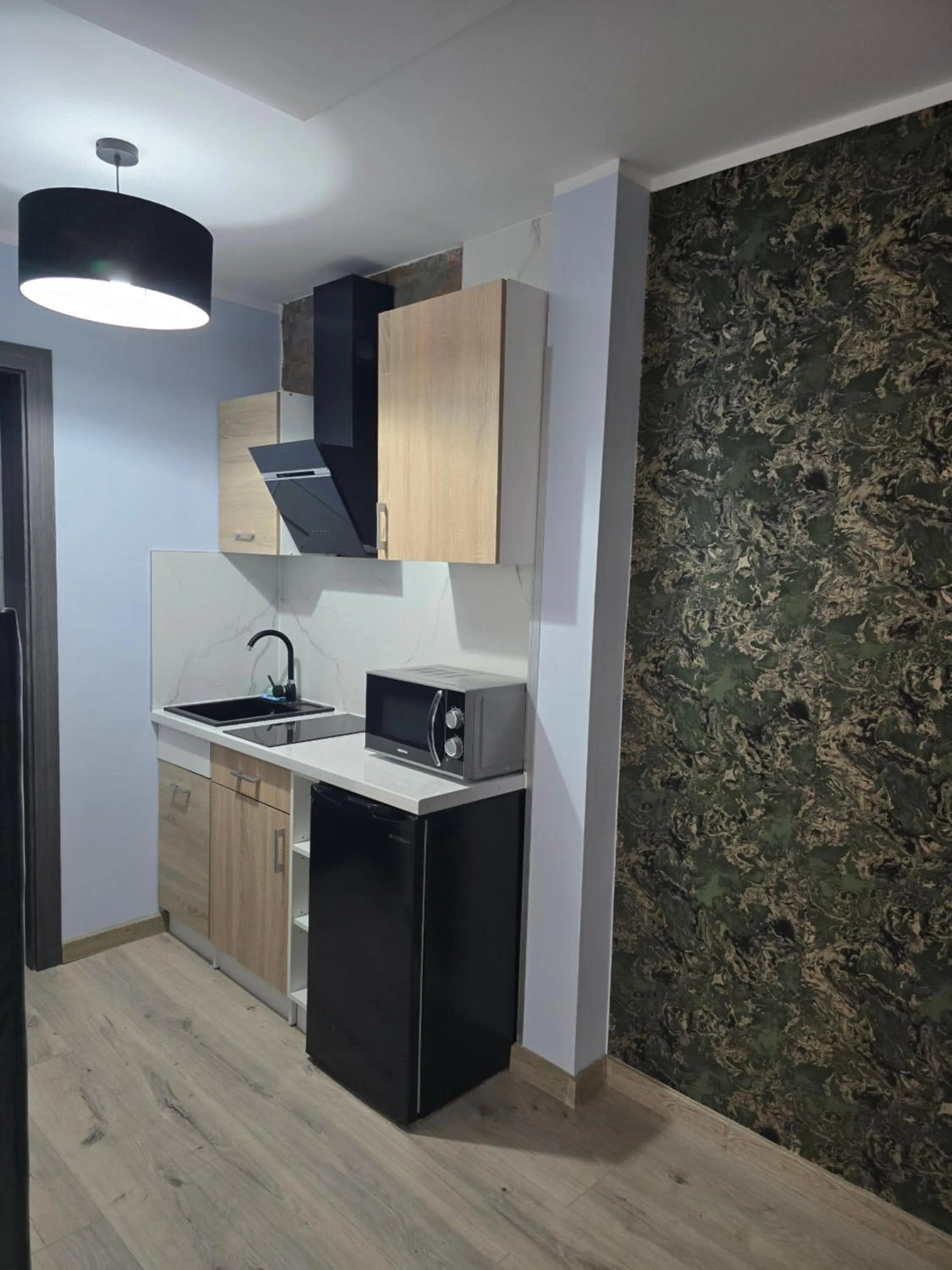 Kitchen or kitchenette in Eldom-NOCLEGI, Kolejowa 15 Wągrowiec