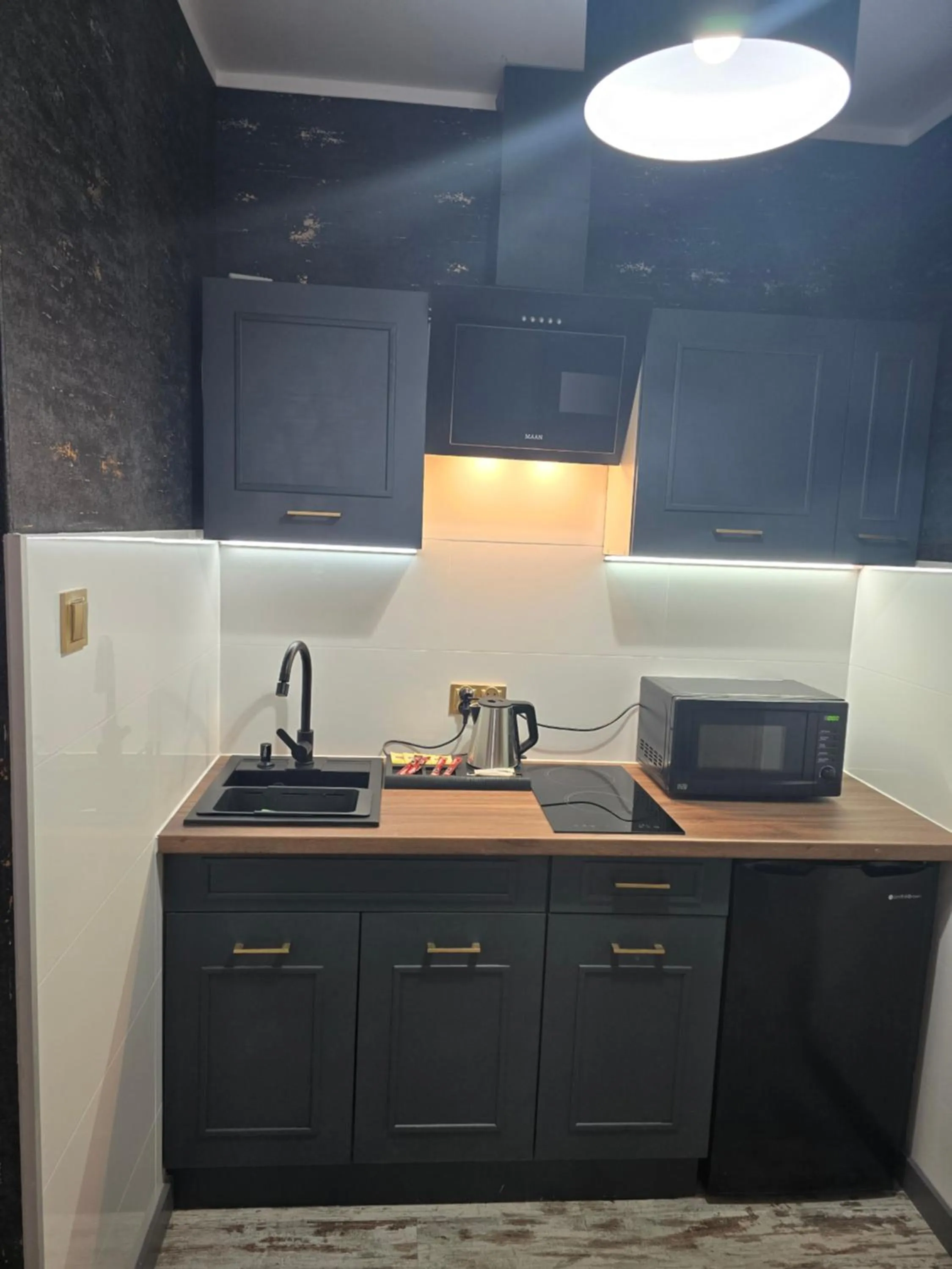 Kitchen or kitchenette in Eldom-NOCLEGI, Kolejowa 15 Wągrowiec