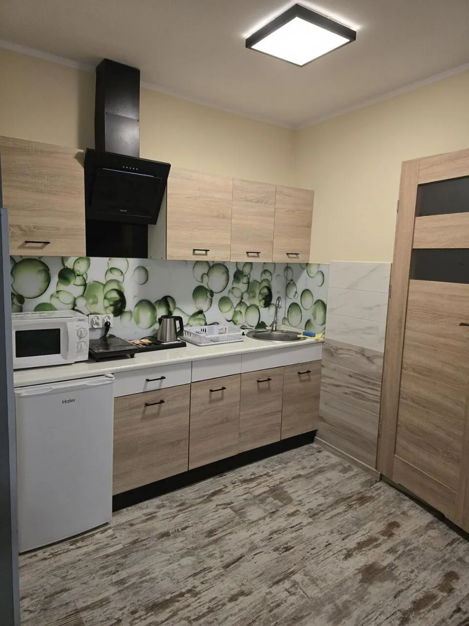 Kitchen or kitchenette in Eldom-NOCLEGI, Kolejowa 15 Wągrowiec