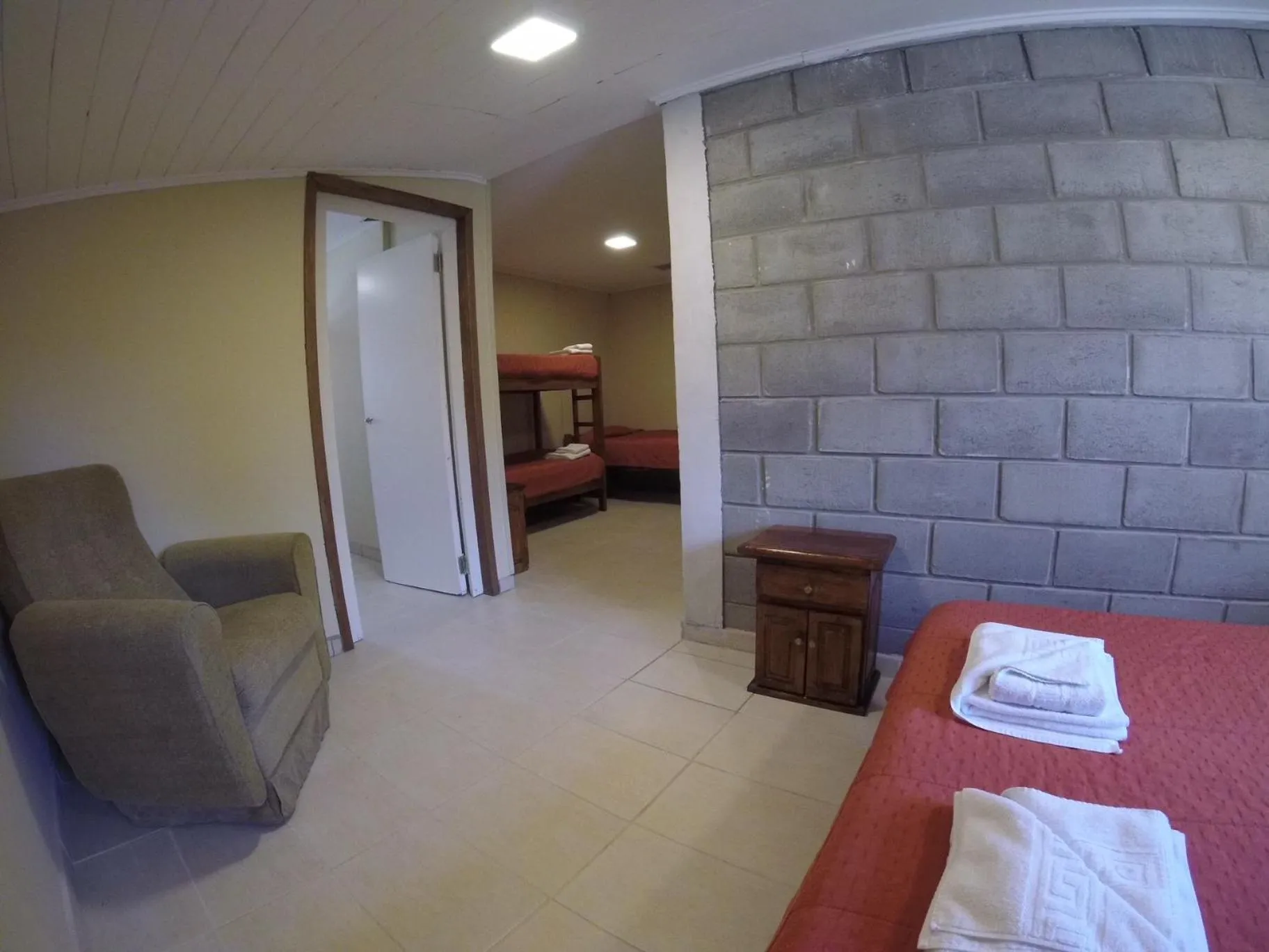 Seating area, Bed in Hostel Los Pioneros