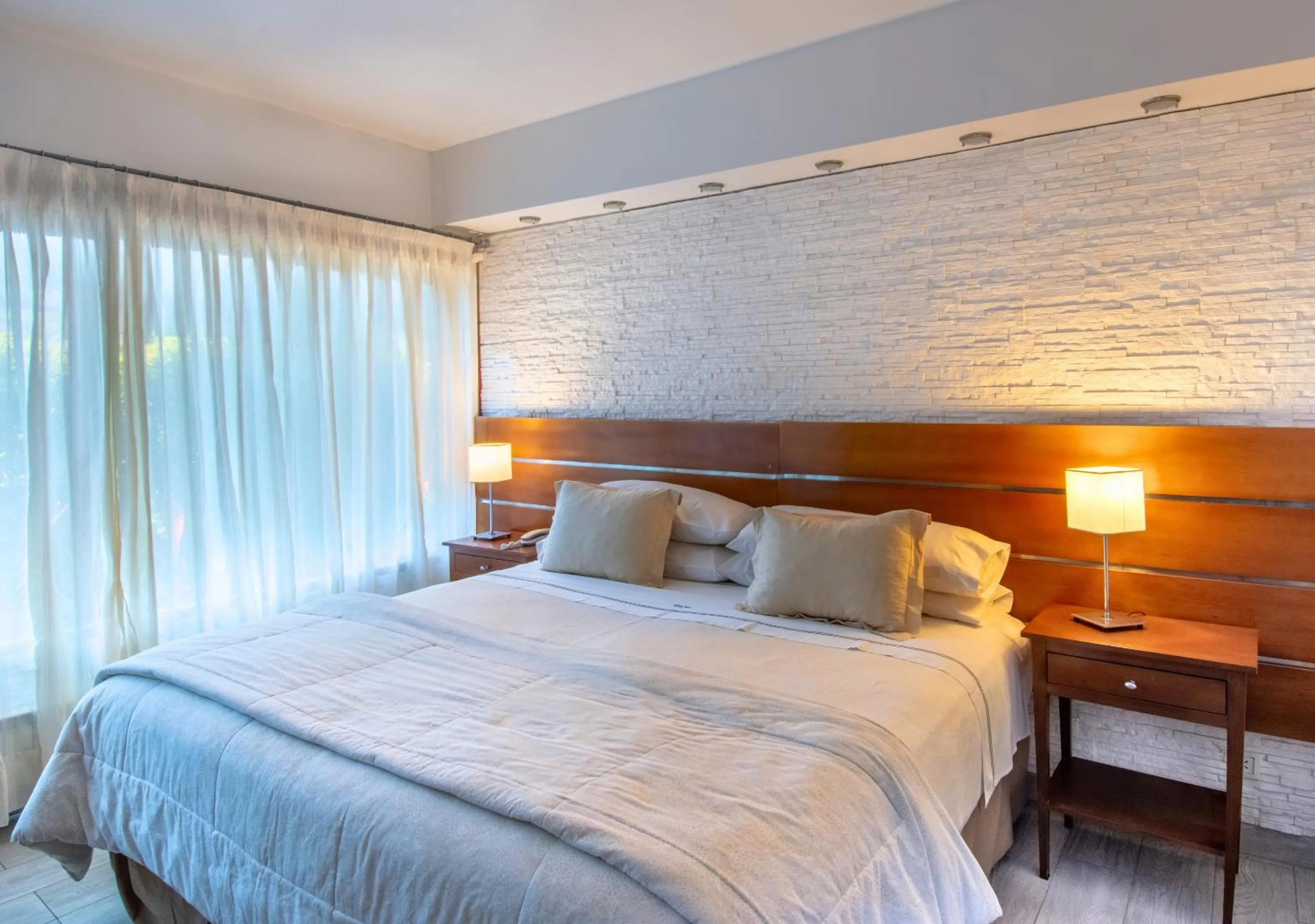 Bed in Costa Serena Aparts & Spa