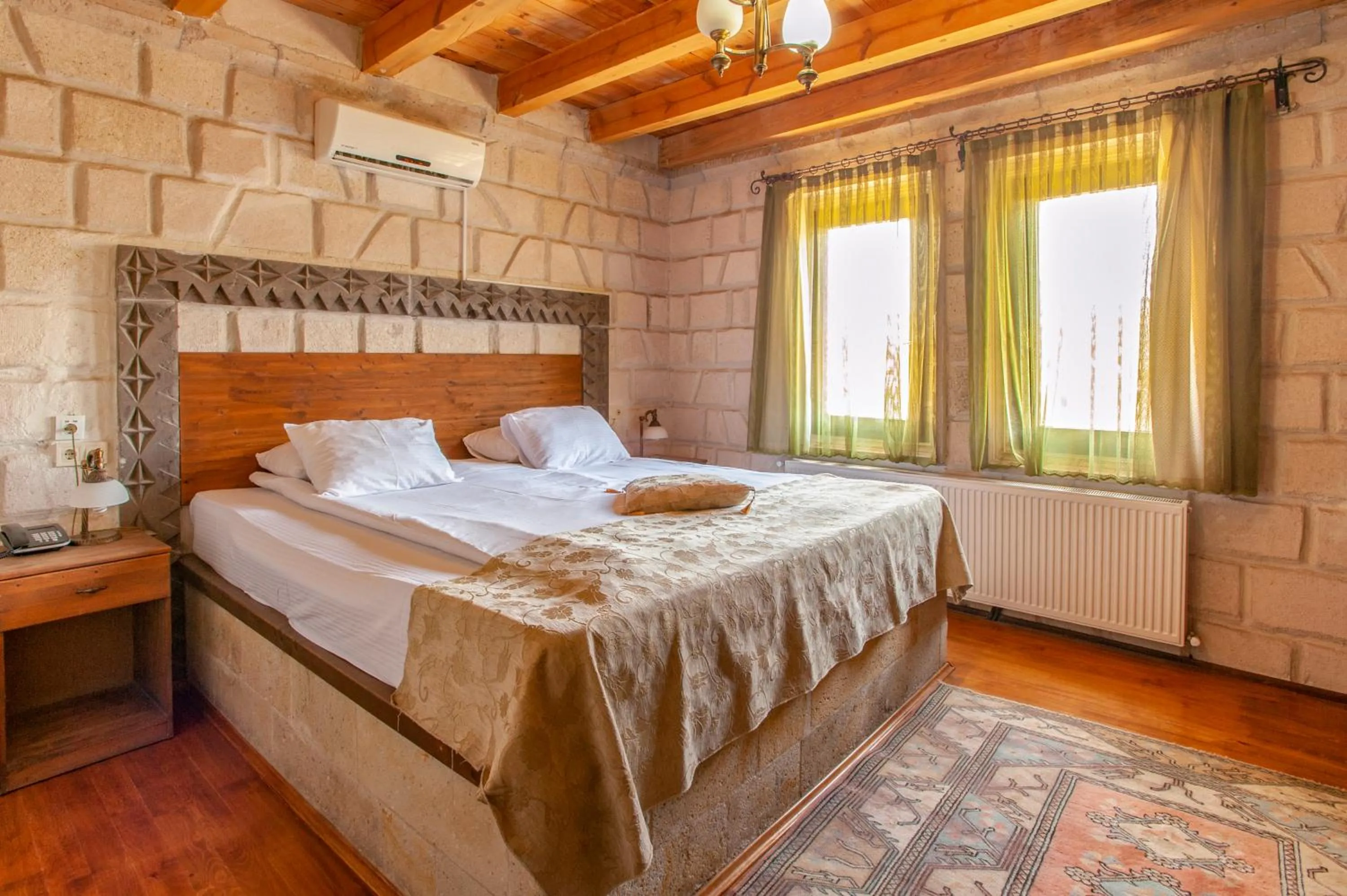 Bed in Ottoman Cave Suites