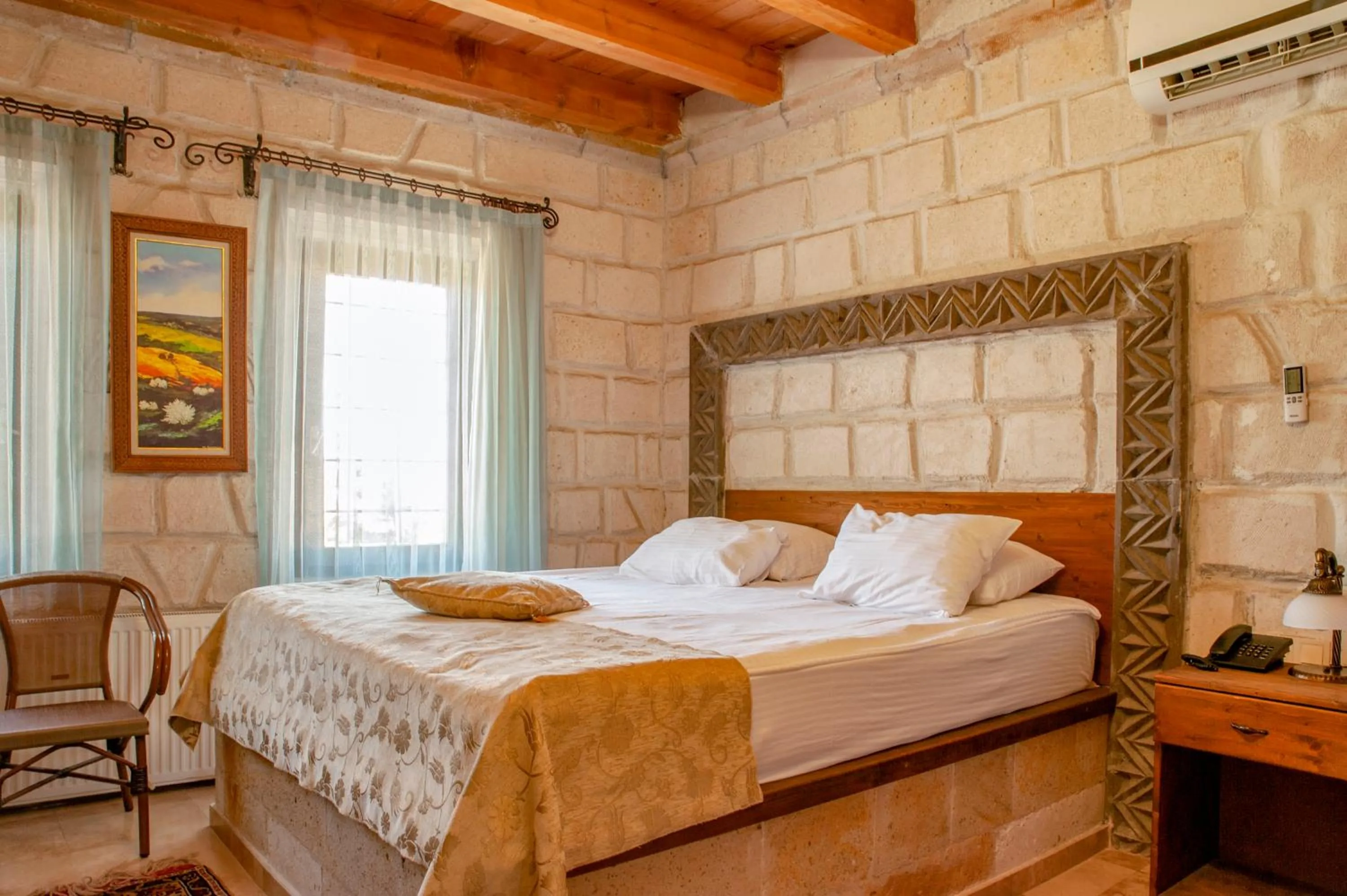 Bed in Ottoman Cave Suites