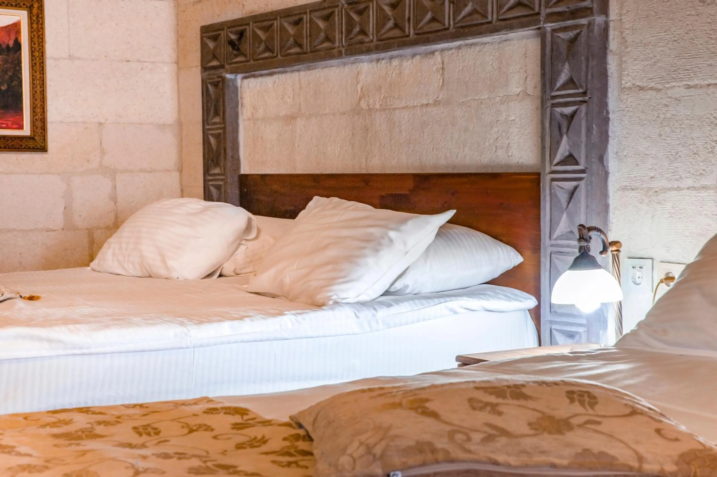 Bed in Ottoman Cave Suites