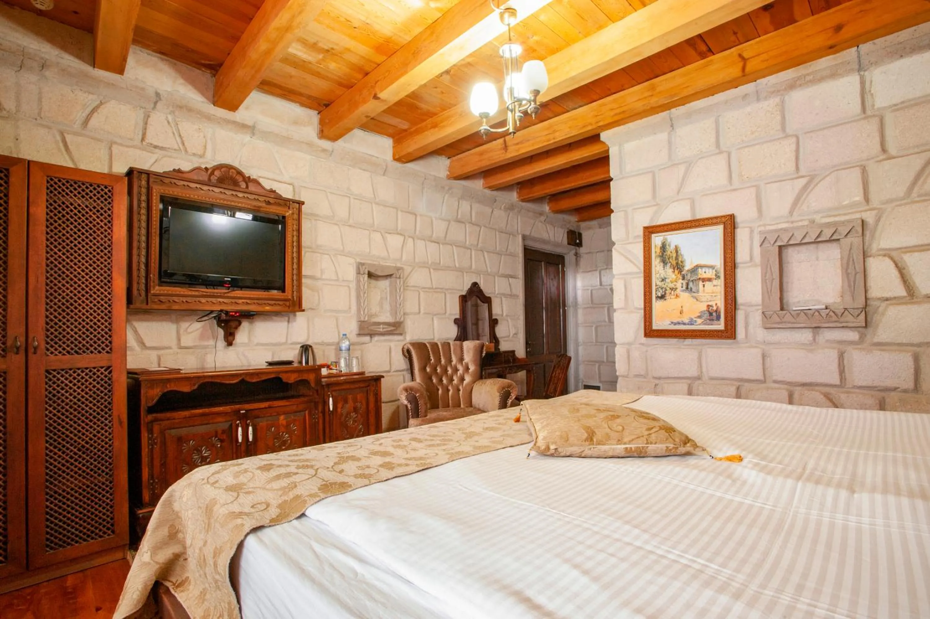 Bed in Ottoman Cave Suites