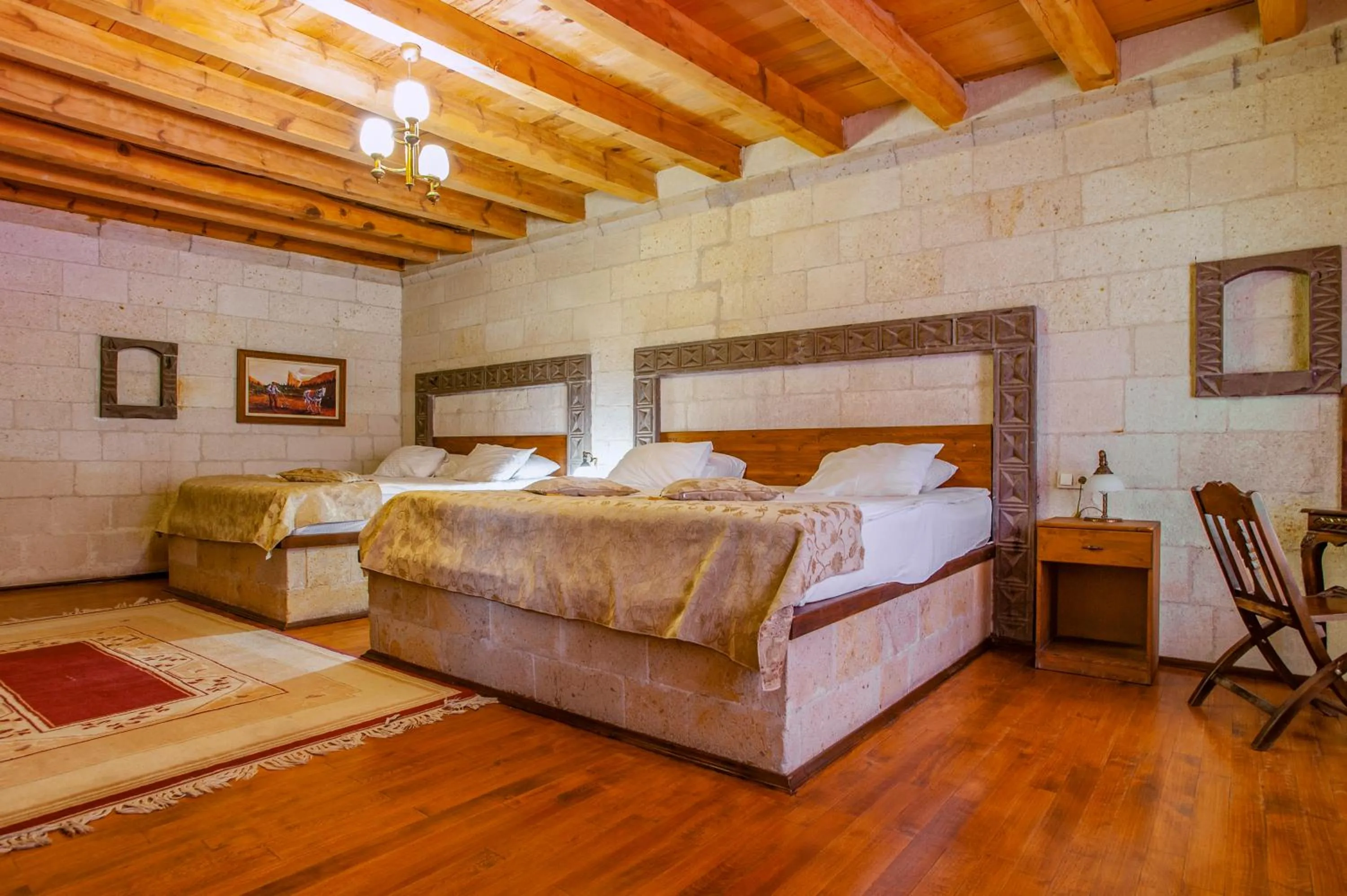 Bed in Ottoman Cave Suites