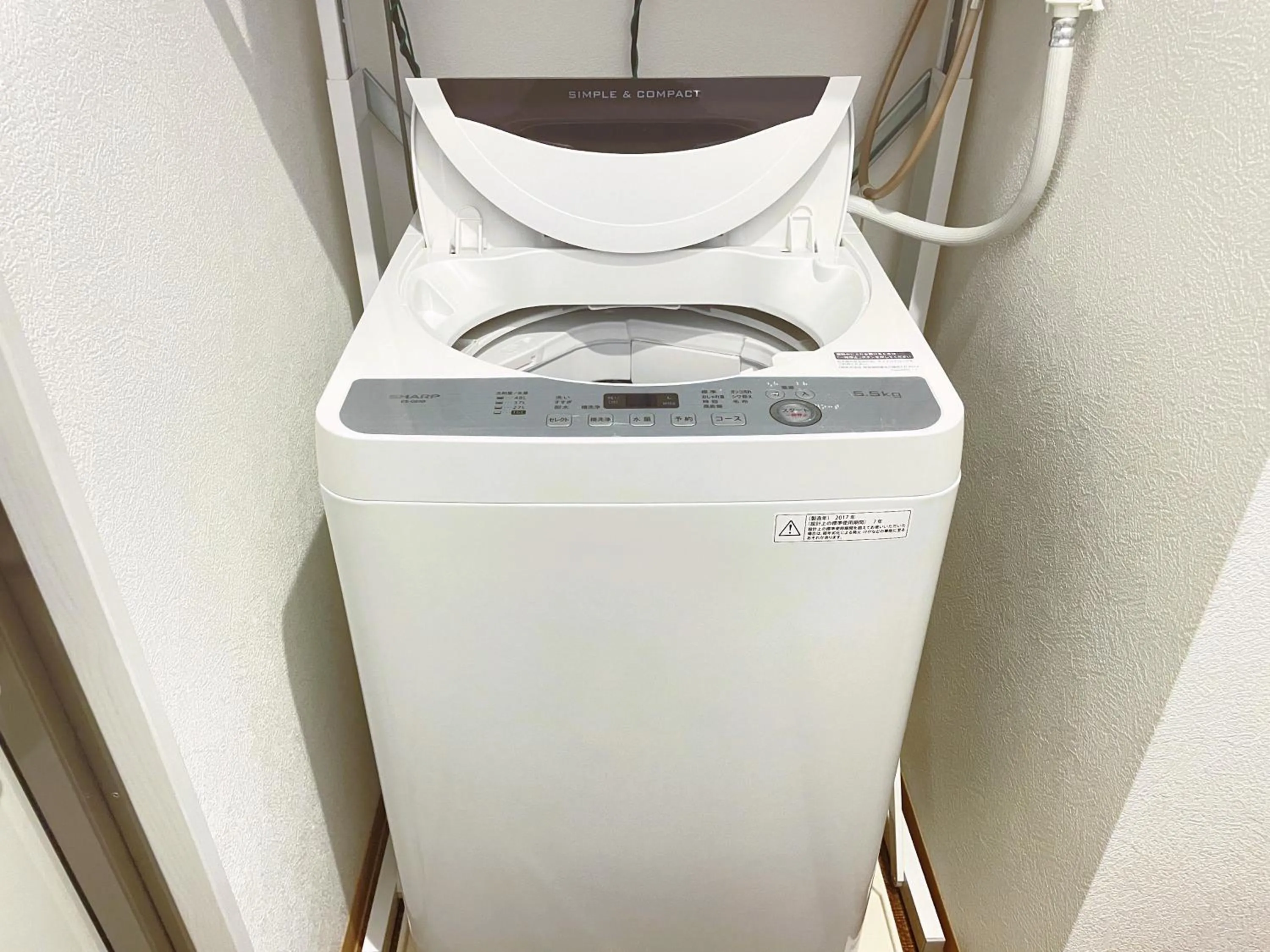 washing machine in BiBi Hotel Cosmos Shintoshin