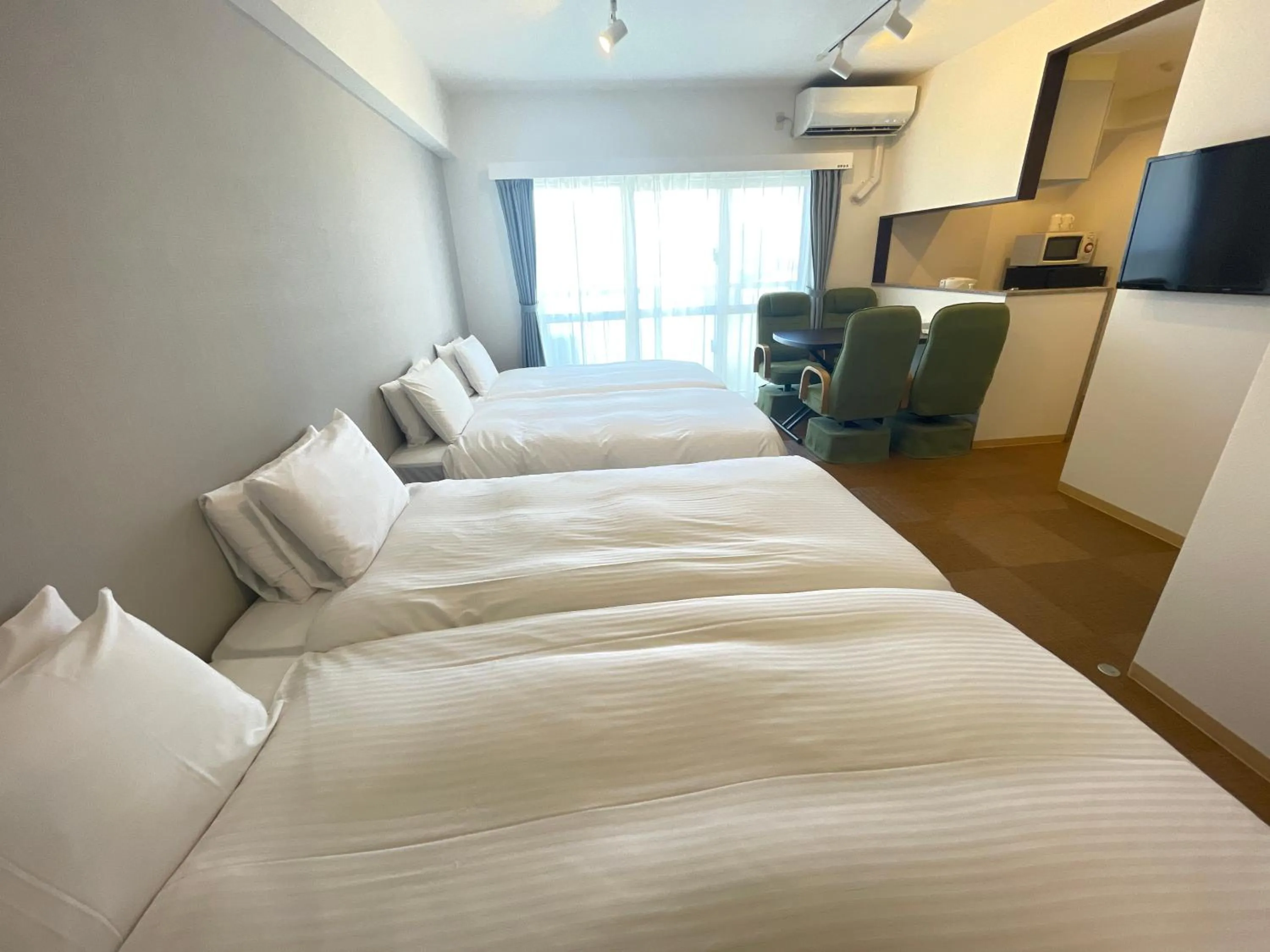 Bed in BiBi Hotel Cosmos Shintoshin