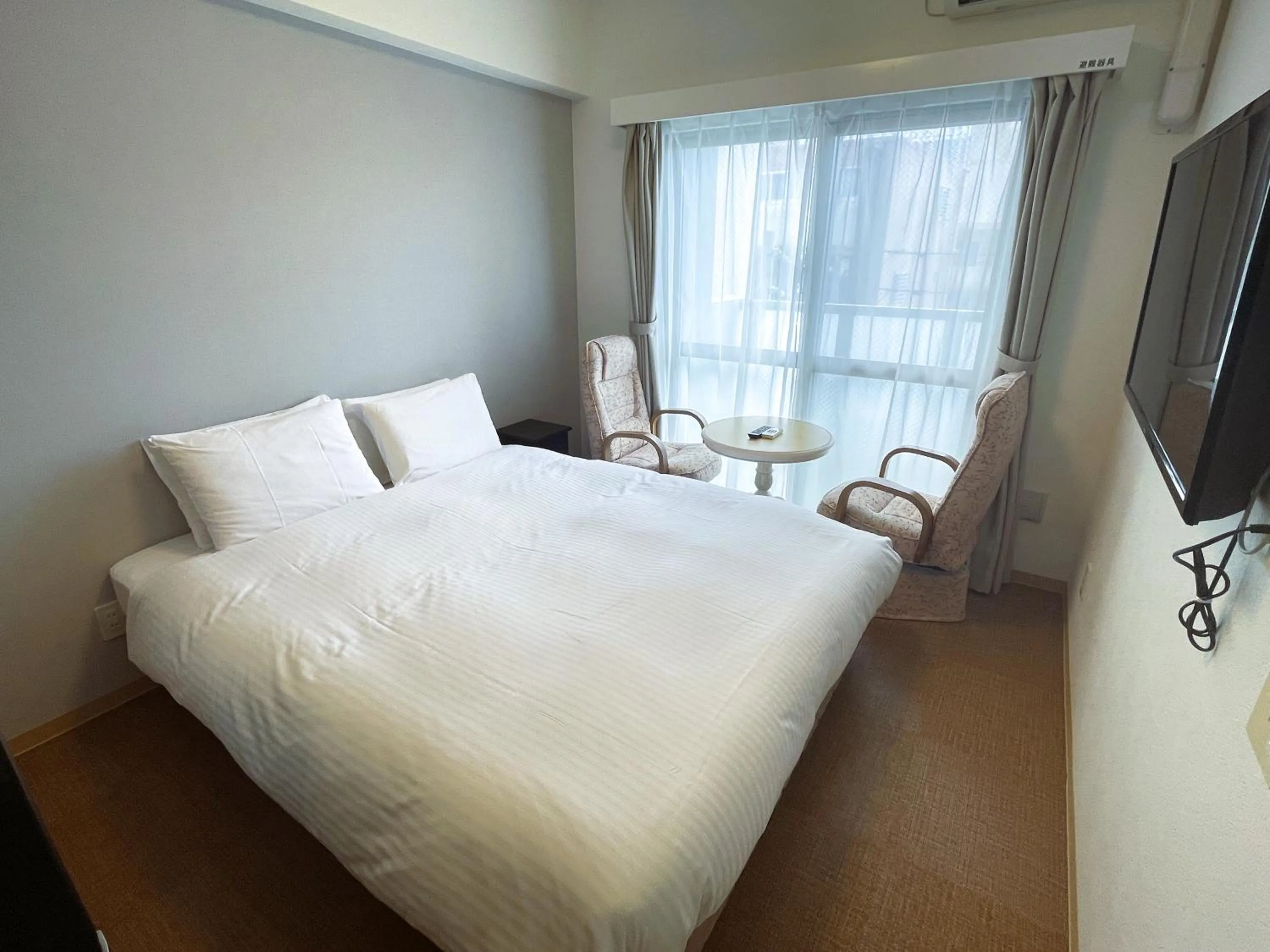 Bed in BiBi Hotel Cosmos Shintoshin