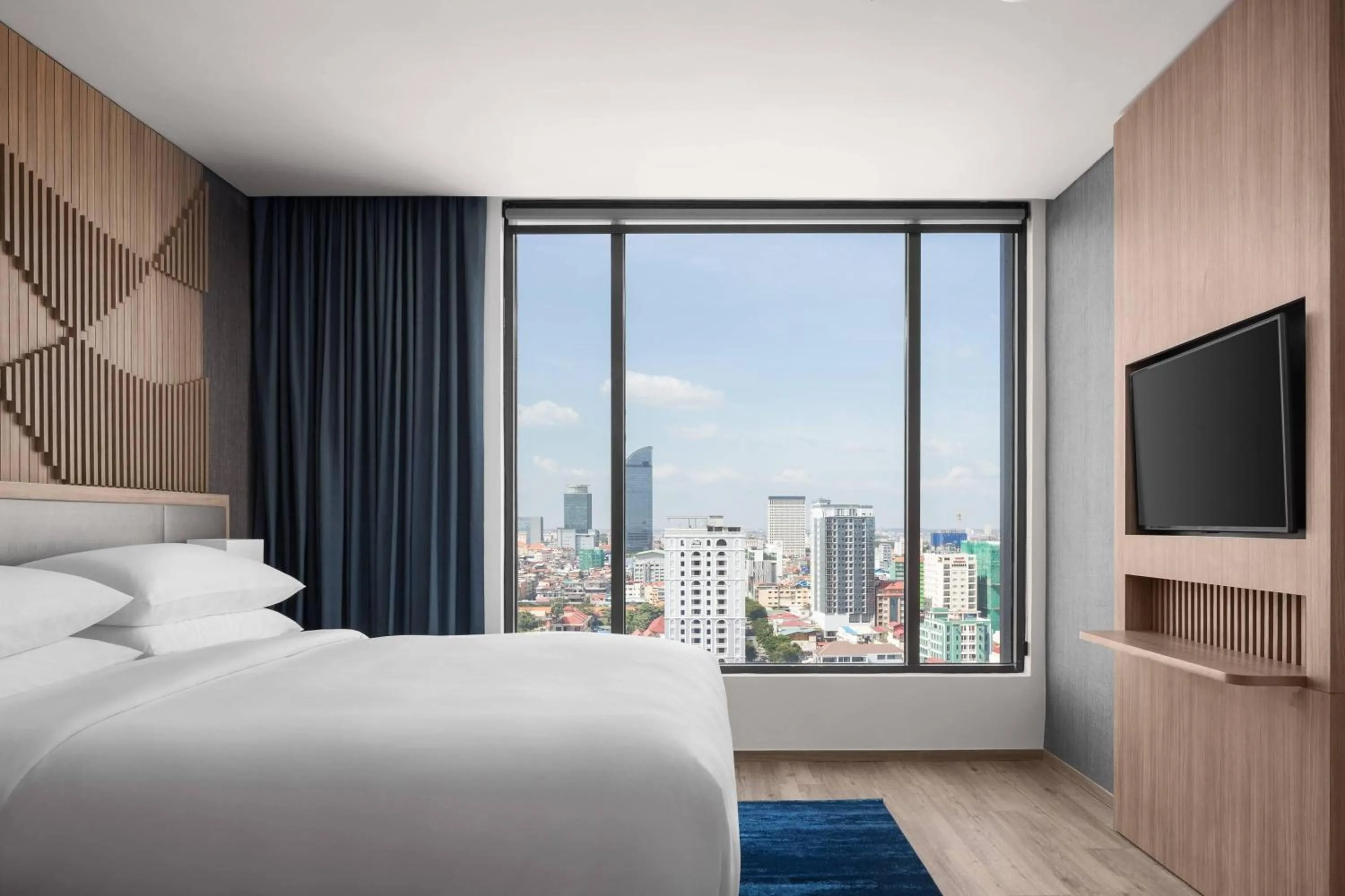 Photo of the whole room, Bed in Courtyard by Marriott Phnom Penh