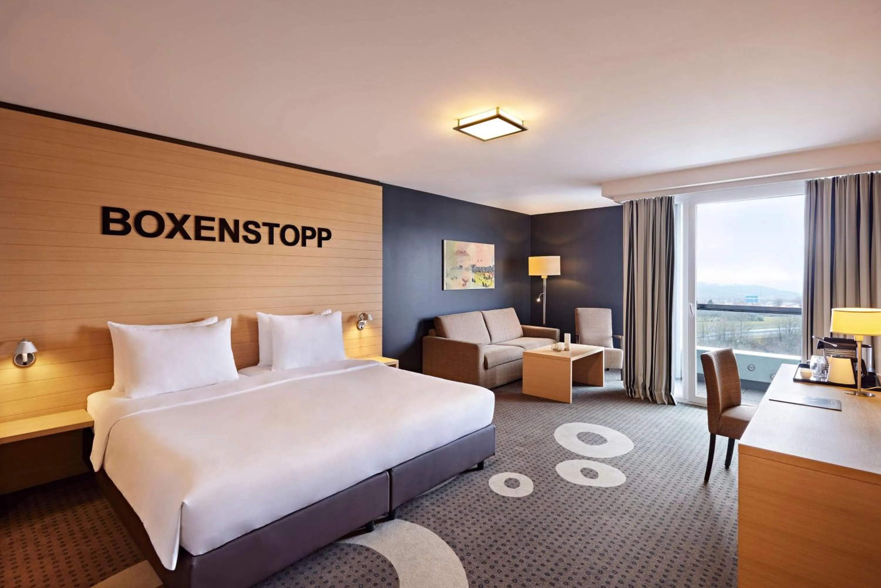 Photo of the whole room, Bed in Nürburgring Congress Hotel